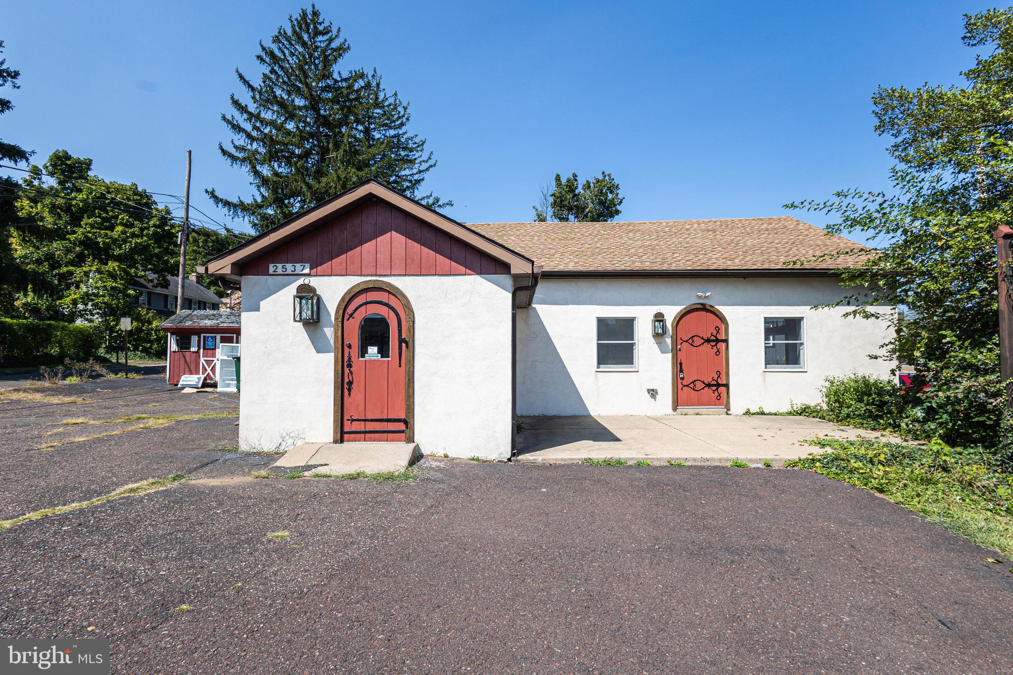 Centrally located in Bucks County, this highly visible freestanding building offers many opportunities. Zoned VC-2 in Buckingham Township, the building has a versatile single story floor plan that is easily adaptable. ADA bathroom. Large parking lot with spaces for over eight cars. Signage available. Easily accessed from routes 263, 413, and 202. Located between New Hope and Doylestown.