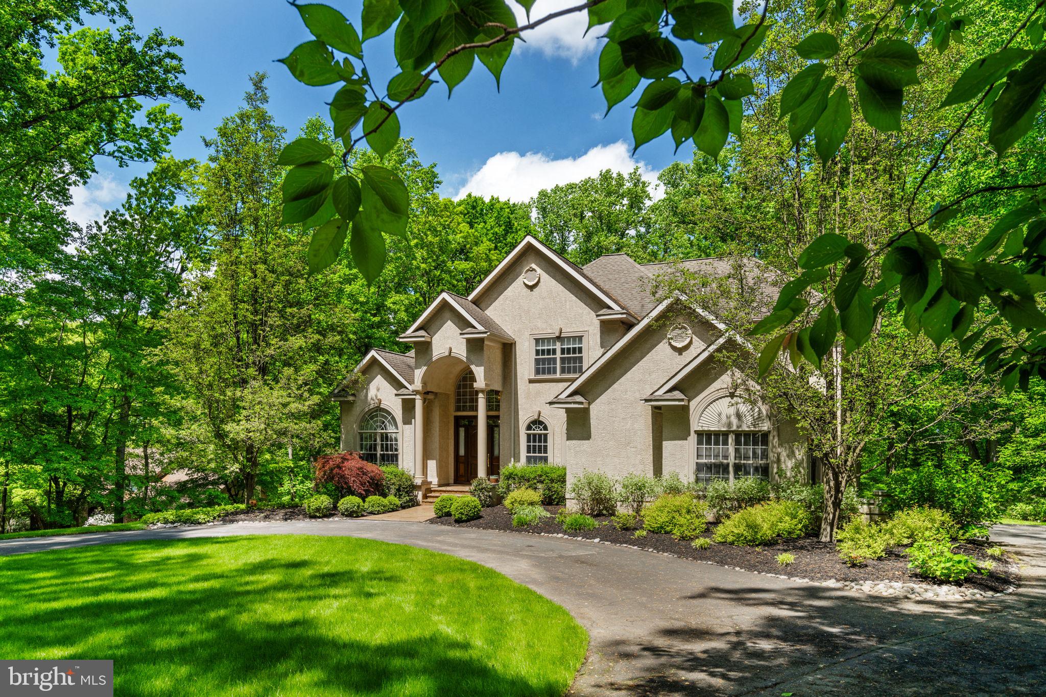 Welcome to 438 Dreshertown Rd, a spectacular 5-bedroom, 3.5-bathroom estate situated on just under 1.18 acres in the heart of Fort Washington. This elegant home offers a grand presence, with a fully custom marble foyer that sets the tone for luxury the moment you step inside. Designed with an open floor plan, the home flows effortlessly from one space to the next, accentuated by custom lighting, grand crown molding in every room, and an abundance of natural light. The gourmet kitchen is the centerpiece of the home, featuring custom cabinetry, premium appliances, and an elevated patio just off the space—perfect for morning coffee or evening gatherings. The patio overlooks a sprawling, flat backyard and enjoys endless sunlight, creating a serene outdoor retreat. The main-level primary suite is a true sanctuary, boasting a fully renovated Italian marble bathroom, two spacious walk-in closets, and exquisite finishes. Upstairs, two additional hardwood-floored bedrooms share a Jack and Jill bathroom, offering both privacy and convenience. The fully finished walk-out basement features 9-foot ceilings, two additional bedrooms, a dedicated office space, and a full bathroom—ideal for guests, an in-law suite, or a private workspace.
Completing this exceptional home is a custom-designed two-car garage, providing both style and functionality. With its grand design, premium upgrades, and unbeatable location, 438 Dreshertown Rd offers an unparalleled living experience. Schedule your private showing today!