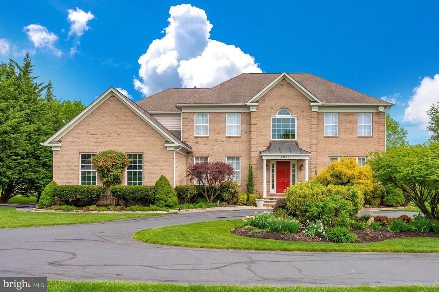 This colonial home is superior to new construction and features higher quality upgrades while being situated on 2+ unbelievably well landscaped acres in the heart of MoCo’s Ag Reserve. Poolesville’s top-ranked school cluster!!! Every detail of this property, from the interior 6582 finished SqFt to the brick exterior front with natural stone accents and grounds have been meticulously planned and maintained since the seller purchased the home in 2009. Built in 2001, the colonial has been updated with tasteful renovations throughout. Stepping inside the south facing two-story foyer is sun drenched, warm and inviting. Gleaming natural hardwood floors run throughout the main and upper floors of the home as well as a completely new custom kitchen. The light filled kitchen and dining area showcase painted maple cabinets with undercabinet lighting, custom woodworking accents and custom glass.  Equipped with new stainless-steel appliances as well as a top-of-the-line SS Dacor brand gas stove top. The center piece of the kitchen is an Amish-built rustic cherry island with quartz top. Extra cabinetry, wine rack and bar make up a butler’s pantry that connects the kitchen area with the formal dining area. Throughout the main level, all fans and lighting systems have been upgraded.  The family area showcases custom built in bookcases, an inlaid sunken floor and all brick wood burning fireplace. The laundry room features custom cabinetry and new Maytag washer and dryer. The entire home has been repainted with light, neutral airy tones. The main level has an ensuite currently being used as the owner’s home office which has newly installed casement windows to enjoy the view of the manicured grounds. Upstairs the sprawling primary suite showcases ceilings with custom crown molding, an oversized, boutique walk-in closet and a newly renovated primary bathroom. The bath includes custom alder cabinets with marble tops, designer shower doors, soaking tub with marble surround, porcelain floors and designer lighting fixtures. The upstairs also features a guest suite and two additional bedrooms that share a connecting bath. The basement is just as impressive as the rest of the home with a full walk out at grade. The basement is fully finished except for the top-of-the-line workshop. The concrete floors have been acid stained with a modern rustic tone that works perfectly with wood accents throughout. This basement is the perfect space for a movie theatre, bar/kitchen, personal gym and more! The workshop area in the basement is enormous and comes complete with LED shop lighting and a utility sink. The basement bathroom is brand new and features subway tile, LVT flooring and modern vanity mirror and lighting. Continuing outside the decking (Trex) is brand new with refinished railing. The walk out from the basement is onto a professionally designed and hardscaped patio. Practically all of the landscaping was installed by the seller and she has taken meticulous care of the trees, shrubs and grasses. Other notable upgrades include a well booster pump, 75gallon hot water heater (propane), HVAC system replaced in 2015 and professionally maintained, new insulated garage doors, all attic insulation replaced with green alternative cellulose, custom linen drapes and shades, French doors, and upgraded door hardware. In this family friendly neighborhood, you can plant your own vegetable garden and enjoy the fruits of your labor. Work from home with hi-speed FIOS! Bring your horses because equestrian trails border this property! Room for a pool? Absolutely! Farmer's Markets, vineyards, craft breweries, and farm-fresh food are all nearby. Welcome home to Dickerson, MD!!!