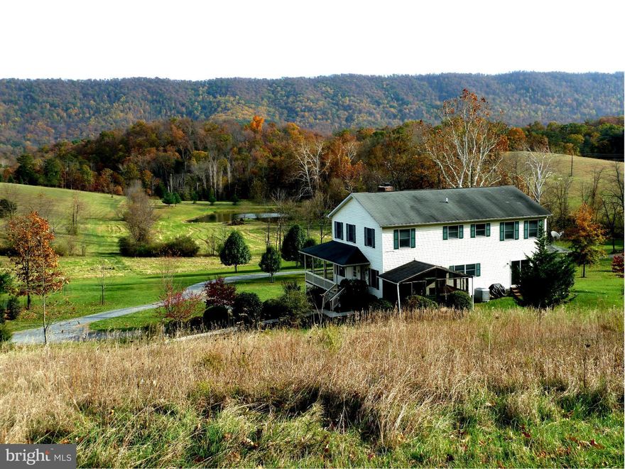 Gorgeous 99+ acre estate only 87 miles to DC.Pause, enjoy from wrap around porch stunning views of North Mtn or relax in rear 17x11  screened porch w/hot tub. Or be active w/ lighted tennis&basketball courts! Spacious home with gleaming wood floors, HUGE kitchen, perfect for entertaining/family gatherings. Imagine cozy times by fireplace watching the seasons change from sun filled living rm. Ahhh.