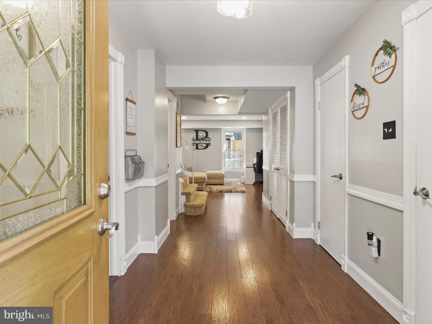 Move-in ready with tasteful updates in the sought-after Pinewood Lake Community. This brick-front END unit townhome is a Mayfair Model with 2,178 sq. ft on three levels. Very spacious living with 4 bedrooms, 2.5 bathrooms, and one of the largest backyards in the community!  You'll enter the property on the lower level, which features a sunlit living area with laminate floors and a gas fireplace that leads to the fully fenced backyard with a pergola (conveys with the sale), a bedroom/office, half bath, and laundry room complete this level.  The second level is where you'll find another bright and sunlit living area, a dining room, a spacious kitchen with stainless steel appliances, plenty of cabinetry, and a large pantry for your food and appliance storage. The third level features the primary bedroom with an en-suite bathroom, two more bedrooms, and a full bathroom. Pull-down stairs lead to the attic for additional storage space and added convenience. The spacious backyard is perfect for hosting barbecues or enjoying quiet evenings, while parking is a breeze with your 2-car driveway and nearby off-street parking options. Residents enjoy fantastic HOA amenities, including a community pond (across the street off of Cedar Lake Ct and Birchlake Ct),  pool, playground, and common areas, including an open, grassy area next to the property.  Located just minutes from major shopping options (Costco, Aldi, Walmart), the Huntington Metro, 495, Washington D.C., Old Town Alexandria, the Pentagon, and Fort Belvoir, this home offers tranquility and convenience.  Recent Updates - Exterior wood fence (2024), Roof (2020), HVAC evaporator coil (2017), Kitchen appliances ( 5 years old), Recessed lighting in living areas, Gas fireplace.