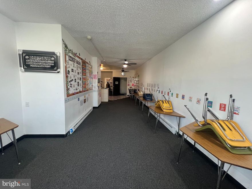 Prime investment opportunity on a high-visibility corridor in rapidly growing Philadelphia. Location truly sets this property apart—just minutes from University City, Center City, Market Street, I-76, major hospitals, and nearby colleges.  This versatile mixed-use property is currently configured and operated as a full Learning/Daycare Center, offering flexible space suitable for a variety of business or investment uses.  The first floor features a welcoming office area, a spacious recreation/classroom area, a convenient kitchenette, a powder room, and access to a rear yard. The second floor provides additional classroom and recreational space, a tiled kitchen area with stainless steel sinks, and another powder room. The basement offers valuable bonus space with a half bath.  Ideally positioned with SEPTA bus service directly outside, this property delivers exceptional accessibility and exposure—an excellent opportunity for investors or owner-users alike. Property is being sold as-is. Schedule your showing today to explore the potential this location has to offer.