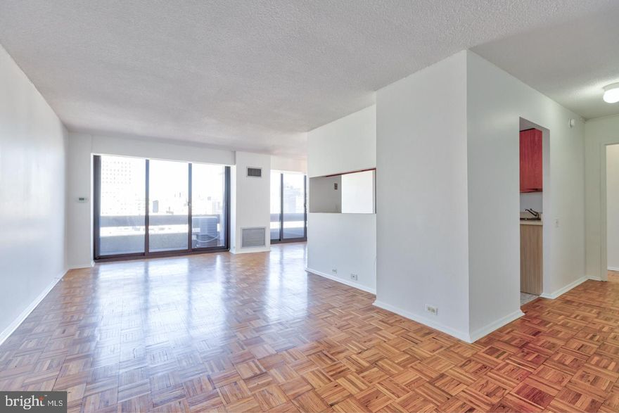 Sunny and bright home with floor-to-ceiling windows at Center City One along Avenue of the Arts. Upon entrance, there is a foyer that reveals a spacious living room. Adjacent and open to the living room is a dining area which provides access to a private Juliet balcony. The kitchen features generous cabinet and counter space. There is a beautifully appointed primary bedroom with a large walk-in closet and ensuite bathroom showcasing a shower/tub combination. The second bedroom enjoys use of a nearby full hall bathroom with a stand-up, glass enclosed shower and single vanity. There is amazing closet space in all rooms and parquet wood floors throughout.  In addition to this amazing home, one parking spot is also included for an additional $300/mo.  Residents of Center City One enjoy a 24 hour doorman, the convenience of ground floor retailers, and an attached parking garage (parking is an additional monthly fee, subject to availability). Located steps from the Avenue of the Arts and just a few short blocks from both Washington Square and Rittenhouse Square, Center City One is literally in the heart of Center City, providing easy access to many of Philadelphia's best restaurants and retailers, the main office corridors, and public transportation.