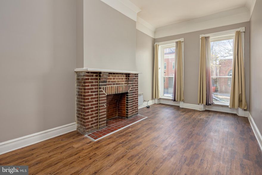 Lovely, spacious, and newly renovated 2 bedroom 1 bathroom apartment in the heart of Mount Vernon for an excellent price! This first floor apartment boasts 10 ft+ ceilings, an original fireplace, floor to ceiling windows to allow a ton of natural light, granite countertops, new appliances, fresh paint, new flooring, and a brand new bathroom. Steps from some of the best attractions, dining, and shopping that Baltimore City has to offer in Historic Mount Vernon! Schedule your showing today!