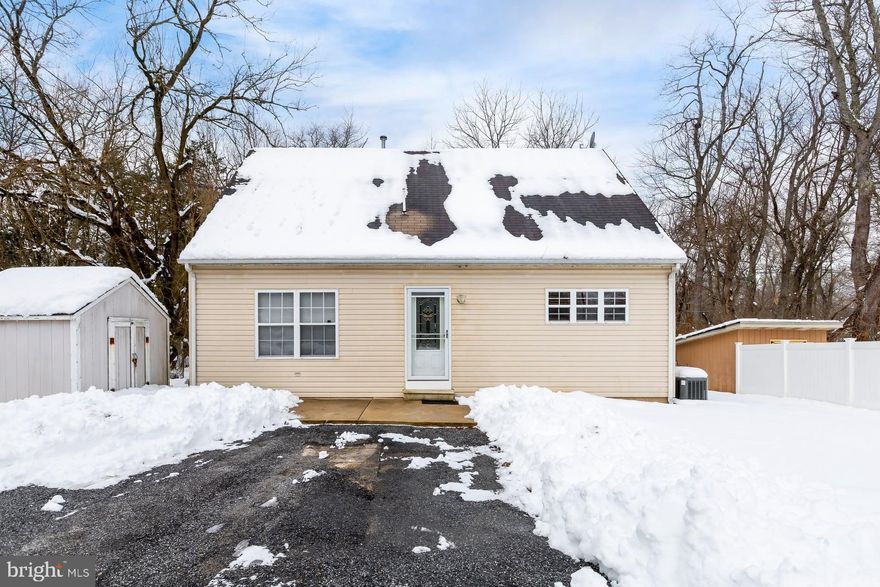 Welcome to this adorable Cape Cod Style home situated back off Delsea Drive.  Walk into this spacious home onto newer vinyl laminate floors that extends into the kitchen and dining area.  Nice size living room off the entrance.  Kitchen is open to a nice size dining area.  Kitchen has gas cooktop, island, buffet area with plenty of storage, stainless steel appliances and built in microwave and oven.  Off the kitchen is a nice size laundry room with plenty of storage and door to backyard.  Off kitchen are french doors to large sunroom.  First floor primary bedroom.  First floor bathroom has been remodeled with tile shower, glass doors and tile floors.  Upstairs you have two large bedrooms, full bathroom and lots of storage areas.  Newer siding, vinyl windows, newer heat and AC, the list goes on....Make you appointment today before this great home is gone.  Convenient location to tons of shopping and major highways.  Minutes to shore points and Philly.  Home is being sold in STRICTLY AS-IS condition.  Per WTMUA there is public sewer available on the road for the buyer to hook in at the buyer's expense.