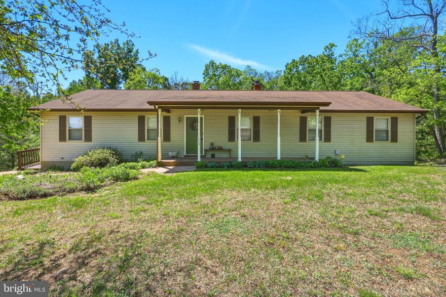 New Price **Motivated empty nesters ready to downsize** If you’ve been dreaming of space, privacy, and the peaceful beauty of the Shenandoah Valley…this is it.

Tucked away in Fort Valley and surrounded by trees, this charming ranch offers room to breathe, room to grow, and a lifestyle that feels like a retreat every single day. With 6 bedrooms and 3 full baths, there’s space for everyone—whether you’re hosting family, working from home, or simply enjoying the extra room.

Start your mornings on the covered front porch with a cup of coffee, listening to the quiet sounds of nature. Step inside to a warm and inviting main level where hardwood floors lead you through an open living and dining space—perfect for gathering around a large table and making memories. Just beyond, the spacious kitchen offers endless cabinet and counter space, along with a huge walk-in pantry ready for all your cooking and baking needs.

Out back, the large deck becomes your own private escape—overlooking peaceful woods, wildlife, and the beauty that makes Fort Valley so special. Evenings can be spent around the fire pit on the patio, enjoying the fresh air and star-filled skies.

The main level offers 5 bedrooms and 2 full bathrooms, including a comfortable primary suite, while the lower level adds even more flexibility with an additional bedroom, full bath, and extra rooms perfect for an office, gym, or creative space. You’ll also find a dedicated laundry room, a large storage area, and access to the garage.  And if you’ve been searching for storage…you’ll love the abundance of it throughout the home.

What truly sets this property apart is the included 25% ownership in an additional 10.158-acre parcel that borders the George Washington National Forest—giving you access to even more land, more privacy, and more opportunity to explore the outdoors right from your doorstep.

Whether you’re looking for a full-time home, a mountain getaway, or a place to simply slow down and enjoy life…this property offers it all.