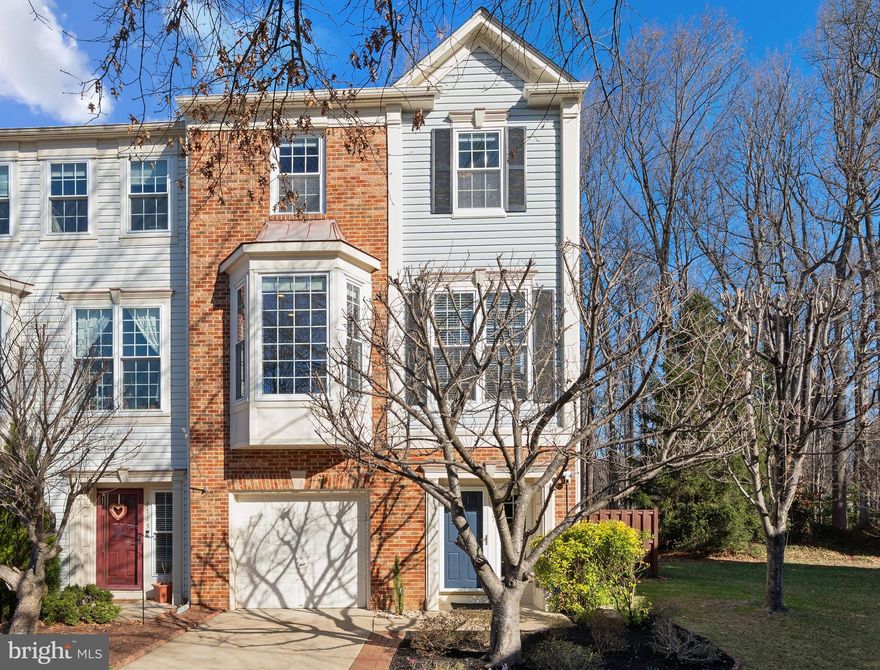 *OFFER DEADLINE - MONDAY 3/24/25 at 5pm EST* Welcome to 7717 Mary Beth Way! This stunning home is located in the sought-after Island Creek neighborhood of Alexandria. This beautifully maintained 4-bedroom, 3.5 bathroom end-unit townhome offers the perfect blend of space, comfort, and privacy.

Upstairs prepare to be stunned by the open main level which is perfect for relaxing after a long day or hosting a gathering for family and friends. This floor boasts a formal dining room, family room with gas fireplace, and a gourmet eat-in kitchen. With gleaming hardwood floors, fresh paint, and large windows which provide ample natural light and beautiful views of the trees and woods behind the home. Off of the family room the deck is a perfect place to take in nature and relax.

The gourmet kitchen features stainless steel appliances, granite countertops, white shaker cabinets, and a subway tile backsplash.

Upstairs you will find the spacious primary bedroom with vaulted ceilings, a walk-in closet, and a large en-suite bathroom. The bathroom features a dual-vanity, rain shower, and a soaking tub. There are two additional bedrooms and a shared hall bath on this level. As well as a laundry nook for added convenience.  

The lower level of the home has a sparkling marble foyer. There you can access the garage equipped with a full-size refrigerator, shelving for additional storage, and a 220-V plug perfect for EV chargers. The lower level also has a spacious bedroom with an en-suite bath that can be used as a flex space – guest room, rec room, gym, or children’s playroom. The possibilities are endless! The lower level provides access to the brick patio and large fenced in yard. The location of this home cannot be beat!

Island Creek offers fantastic amenities – a clubhouse, outdoor pool, a lake for catch and release fishing, walking trails, tennis courts, and playgrounds throughout. The local elementary school is also located within the neighborhood. Do not miss the opportunity to make this beautiful home and community yours!