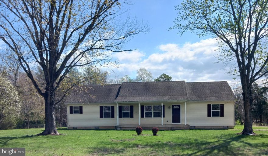 Charming one-level home in Madison County with a perfect blend of country charm, yet just 8 miles to the town of Madison or Orange and 12 miles to Culpeper. With 3 bedrooms and 2 baths it is ideal for easy living. It has central air and heat via a heat pump and also has a chimney for a woodstove if so desired. It has a covered front porch and a deck in the rear. The spacious yard offers room for backyard chickens or rabbits or pets to run and play. A brand new state of the art septic tank and alternative drainfield was installed in 2019. Nice level lawn in front of the home and a gentle slope in the rear. Madison County Public Schools serve this property and several private schools are within 8 miles. High speed internet/cable/phone can be obtained through FireFly. This home is perfect for families, animal lovers, or anyone seeking to get away from the city/town nuances and enjoy a country retreat with space and tranquility.