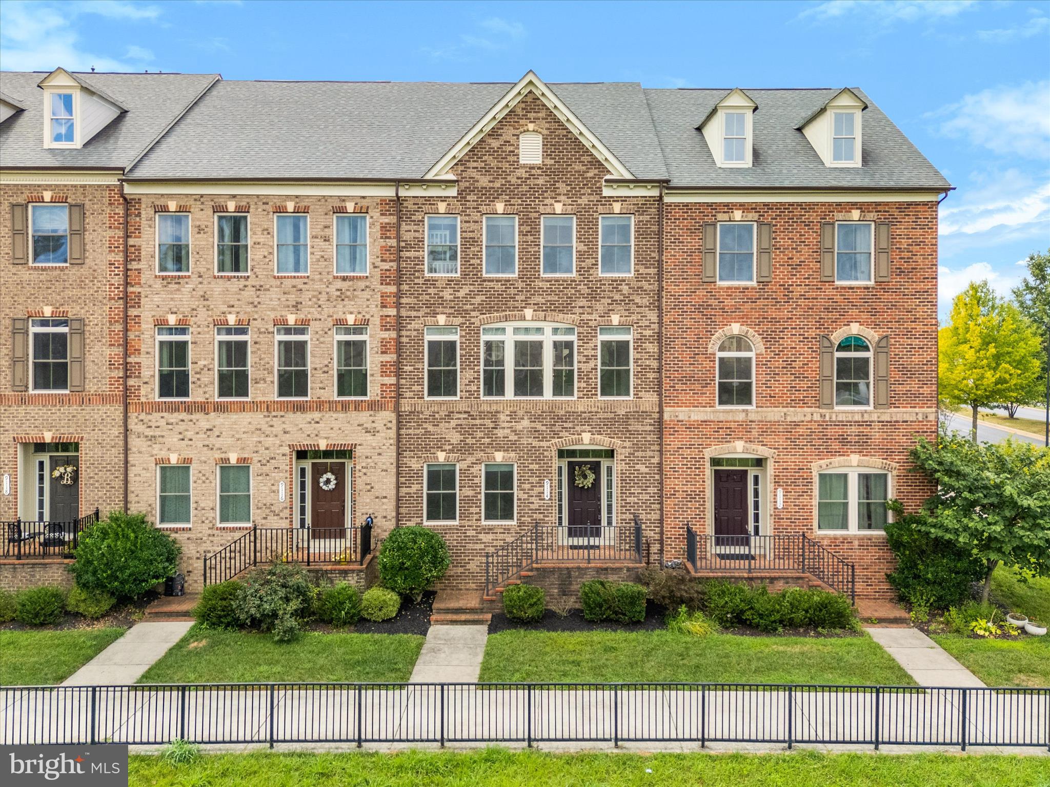 Welcome home to 9114 Kenway Lane... a beautifully maintained and freshly updated brick-front townhome, located in the highly sought-after Villages of Urbana—one of Frederick County’s most vibrant and desirable communities. With 3 spacious bedrooms, 3 full baths, 1 half bath, and over 2,000 square feet of comfortable living space, this home offers the perfect blend of modern style, functional design, and unbeatable location.
Step inside and immediately notice the fresh, top-to-bottom paint that gives the entire home a crisp, clean feel. The inviting open floorplan is perfect for both everyday living and entertaining, featuring an abundance of natural light, high ceilings, and a seamless flow from room to room.
The heart of this home is its gourmet kitchen, complete with stainless steel appliances, granite countertops, a large center island with bar seating, and ample cabinetry for all your storage needs. Whether you’re preparing a casual breakfast or hosting a dinner party, this kitchen delivers both style and functionality.
Just off the kitchen, step outside to your private rear deck—a peaceful spot to relax with your morning coffee, grill dinner, or enjoy the fresh air.
The main level also includes a generously sized living and dining area with rich hardwood floors and large windows, along with a convenient half bath for guests. See the mirror in the dining area... open it up and take a peek for a unique surprise that the youngest homebuyers are sure to enjoy!
Upstairs, the spacious owner’s suite features a tray ceiling, walk-in closet, and a luxurious en-suite bath with dual vanities and a separate glass-enclosed shower with dual shower heads. Two additional bedrooms share a well-appointed full bath and offer plenty of space for family, guests, or a home office.
Downstairs, the finished lower level includes a large office with beautiful French doors, a full bathroom, and access to the attached 2-car garage. Whether you need a media room, workout space, or additional guest quarters, this flexible area can be customized to suit your lifestyle. The attached two-car garage and private driveway provide parking for up to four vehicles—an uncommon luxury in townhome living.
Beyond the home itself, the Villages of Urbana offers an unbeatable lifestyle. Enjoy easy access to shopping, dining, grocery stores, award-winning schools, and resort-style community amenities including multiple pools, clubhouses, fitness centers, playgrounds, and walking trails. Commuters will appreciate the easy access to I-270 and MD-355, making travel to Frederick, Gaithersburg, Rockville, and even DC a breeze.
This is more than just a home—it’s a lifestyle upgrade in one of the area's most premiere neighborhoods. Whether you're a first-time buyer, relocating, or simply looking to upgrade, this move-in ready home checks every box. Welcome to 9114 Kenway Lane... welcome HOME!