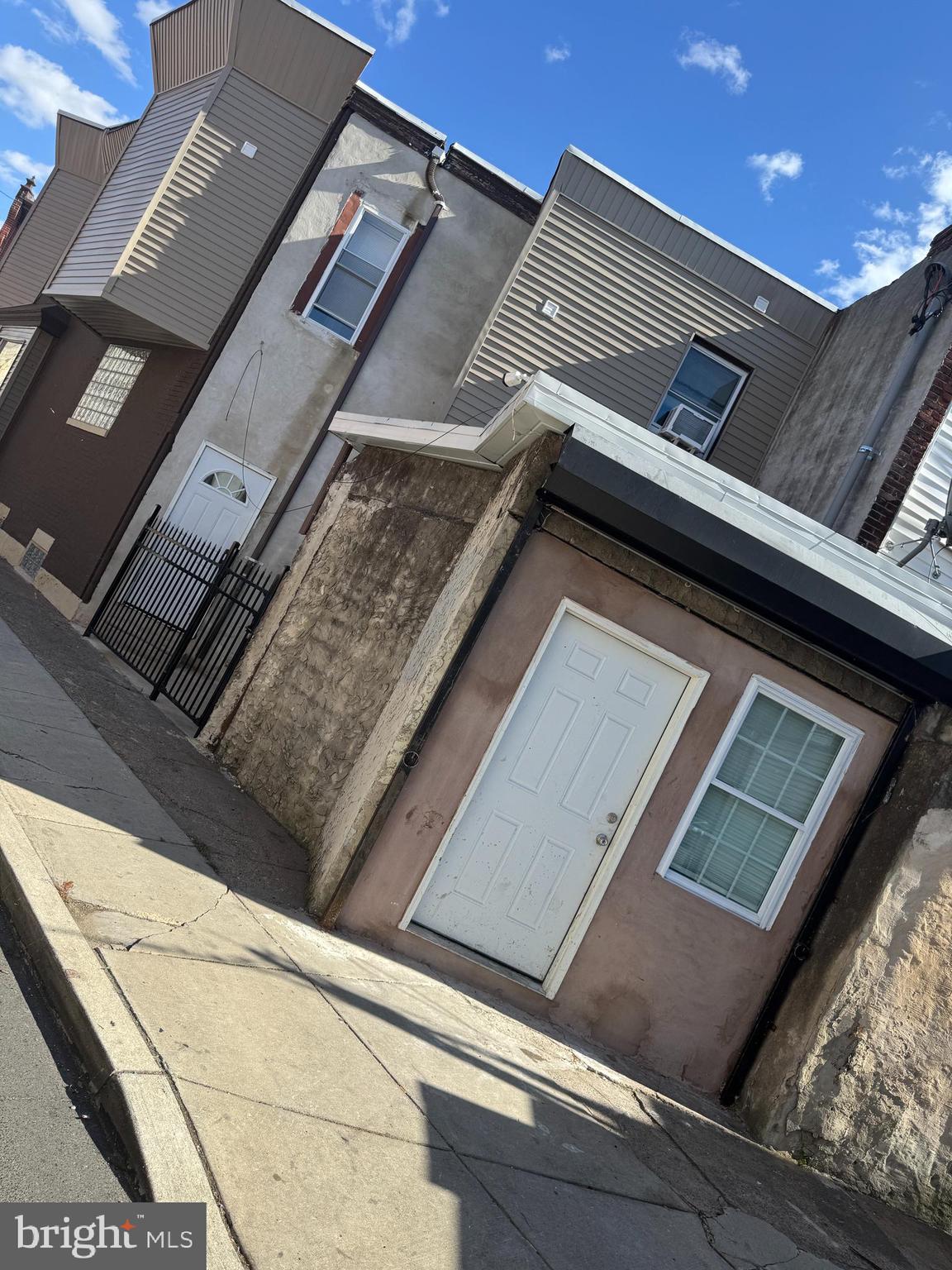 JUST HIT MARKET IN TEMPLE AREA!!! Great corner property on a quiet block. Three studio apartments rented for 1K a piece with washer and dryer. An extra bonus living space in the garage is rented for $600. The commercial space is not rented however the completely finished basement is rented for $800 per month. The total current income is $4400 per month. The commercial space can be rented for $1200 bringing the projected income to $5600 per month. Security System, fire alarm system and parking. Property to be sold as is. Seller requests use of ACT Land Transfer. Schedule Your Showing Today!!