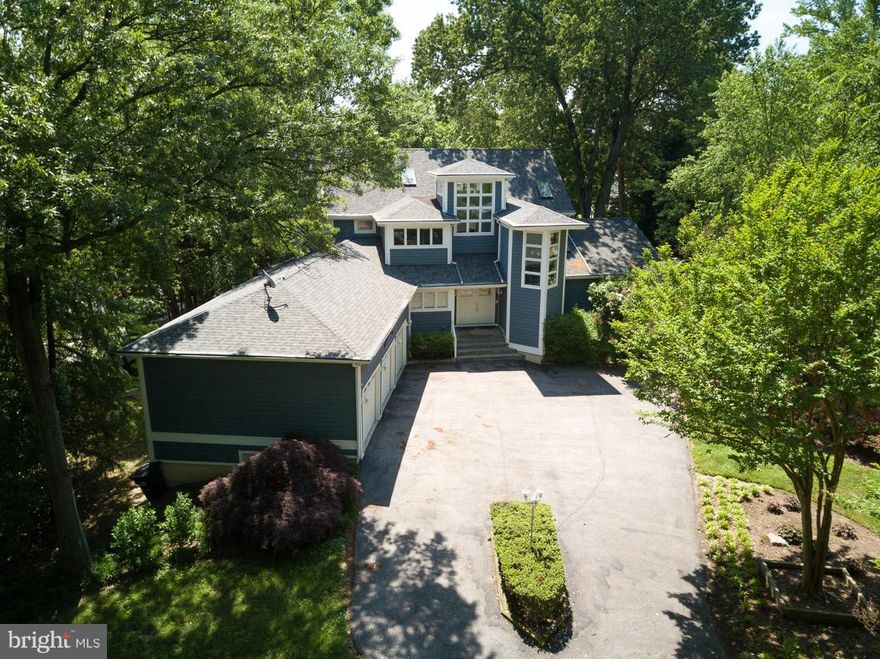 Almost every room has a water view. Trex deck,w/screened in porch. Private TREX Pier-6ft median water 115 water frontage,w/2 boat slips, 1 boat lift & jet ski lift. 3 CAR GARAGE WITH WORKSHOP-This house is an entertainer delight with a gourmet kitchen, stunning water views and huge flat backyard! Not to mention oversized driveway - room for 10 cars! Full house generator- Tesla charging station! Enclosed dog run w/door. $400k in upgrades! This is one of a kind! Come and experience for yourself!