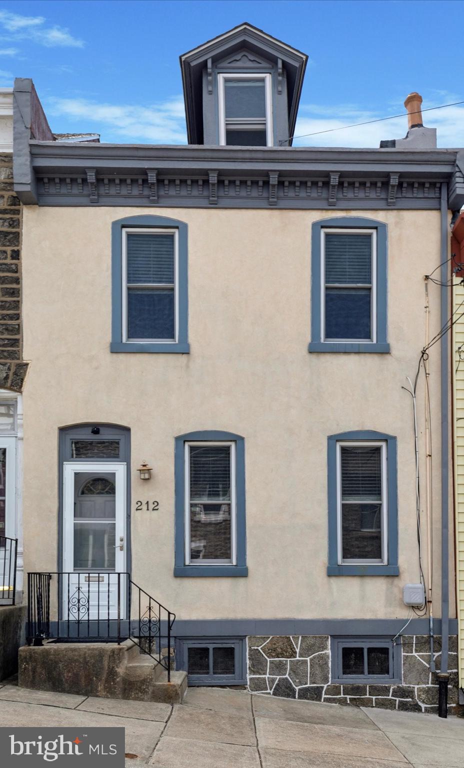 Move right in to this well maintained Manayunk Townhome. This is a large home featuring an open living room/dining room area with hardwood floors and upgraded baseboard/crown moldings. The updated kitchen features a breakfast bar, quartz countertops, subway tiled backsplash and tiled floor. A sizeable mud room with a powder room is accessed through the kitchen and leads to the private, fenced yard with brick patio, and garden area.
2 large bedrooms are found on the 2nd floor as well as the updated hall bath with convenient laundry area. The third floor contains 2 additional large bedrooms.
There is a full basement with plenty of storage areas and room to finish!
New roof in 2018, and sewer line replaced in 2020.
Great location, close to Wissahickon train station and the shops and restaurants of main street Manayunk!
A pleasure to show. Call for appt.