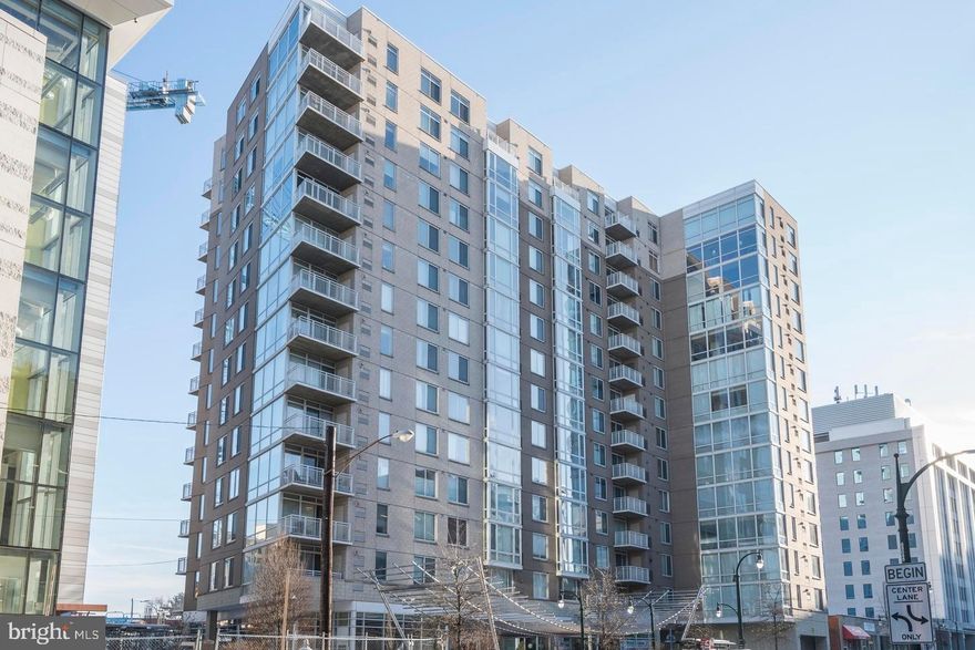 Experience the pinnacle of urban living at Crescent Condominiums in the heart of Downtown Silver Spring. This corner unit has beautiful hardwood floors and an amazing south-facing view from 14 floors up! The gourmet kitchen overlooks the main living area and is equipped with new pull-out drawers, a new refrigerator, and recessed lighting. The primary bedroom offers a walk-in closet and access to the dual-entry bath, which has been renovated with a new vanity, walk-in shower, and Toto Washlet. A second bedroom comes with a built-in Murphy bed, perfect for hosting guests. This condo unit is also equipped with a washer and dryer as well as a private balcony.

Enjoy the many amenities of the Crescent, a pet-friendly building with an on-site manager. Take advantage of the fitness center, billiard room, and lounge available exclusively to residents. Located in the vibrant Downtown Silver Spring area, this condo is just steps away from a plethora of dining options such as Whole Foods, &Pizza, and BurgerFi. The metro, Safeway, Giant, and more are just a few blocks away, making this location the epitome of convenience.