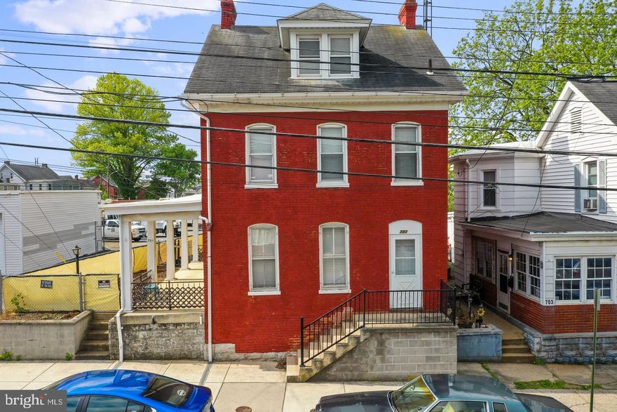 Don’t miss this investment opportunity at 701 West Washington Street! This two-unit property with separate electric meters is ready to generate rental income. Each unit features 2 bedrooms and 1 full bathroom. The upper unit is currently rented for $1,250/month, providing immediate income, while the lower unit is posted for rent at $1,100/month and in the process of being filled. The main level boasts a bright living room, cozy dining room, and a fully functional kitchen. The upper level offers a second unit with privacy and flexibility. The detached one-car garage, alley access, and rear parking add convenience. Sold as-is and move-in ready, this property is a fantastic opportunity to own an income-generating gem in downtown Hagerstown! THIS PROPERTY IS ALSO LISTED FOR RENT AND FOR SALE.