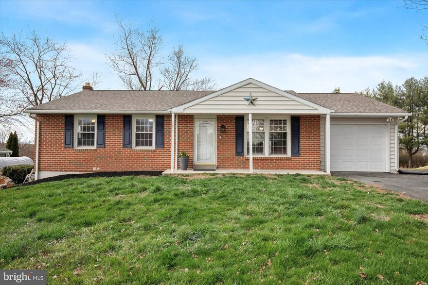 Nestled in an idyllic serene setting, this ranch-style home has been well-loved and carefully maintained.
It is the perfect oasis for endless entertainment and relaxation. Upon entering the home, you will fall in love with the open floor plan that combines comfort and style. This three-bedroom, two-bath home offers the ease of single-story living with modern upgrades, thoughtful details, and an inviting layout. The first floor living area seamlessly combines the living room, dining room, and kitchen to create an ideal space for entertaining friends and family. As you enter the home, you are greeted with a living room filled with natural sunlight from the front bay window. The living room opens into the dining area and tile-floor kitchen with granite countertops and tile backsplash, stainless steel appliances, plenty of cabinets, a large pantry, and lots of cooking space perfect for entertaining and family gatherings. Next to the dining room is a large sunroom that can be used as an office area, playroom, TV room, or a place to spend peaceful mornings with a cup of coffee or relaxing at the end of the day enjoying the view of the expansive backyard. Step just outside the sunroom onto a large deck that is perfect for grilling and entertaining. Completing the first level is an expansive primary bedroom suite with and a modern en-suite bathroom featuring an oversized stall shower. Two additional bedrooms, a full hall bath, and a laundry room complete the main level that shines with recessed lighting and LVP flooring throughout.  
With an outside entrance, the finished lower level is ideal as an in-law quarters or for teenagers needing their own space. It offers a large area for entertaining and two rooms with closets. Included in the basement is a full-sized refrigerator and space configured for you to install a kitchen sink and bathroom. In addition to the attached garage, there is a detached over-sized garage built for the car enthusiast looking for a place to work on cars. This garage is equipped with electric, water, heat, and air conditioning and includes a paved parking area large enough for several vehicles. Tucked away in a quiet community, this beautiful home is centrally located to parks, biking and jogging trails, golf courses, fantastic local eateries and shopping centers, area hospitals, and major commuter routes to the city. Schedule a personal tour to really appreciate all of this home's charm.  Security cameras in use. Open House on Thursday, April 3 from 4 – 6 PM and Friday, April 4 from 4-6 PM.