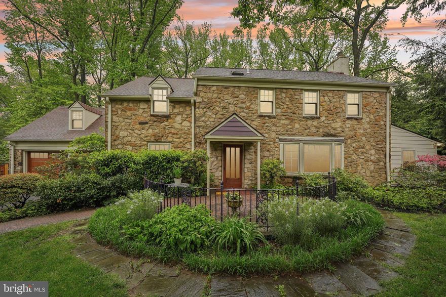 Welcome to 949 Leopard Road, a quintessential stone colonial tucked into one of Rydal’s most sought-after streets. Timeless elegance, modern comfort, and an abundance of living space come together in this beautifully maintained 4-bedroom, 3.1-bath residence. Set on a lushly landscaped property bursting with blooming rhododendrons and vibrant gardens, this home offers inspirational views and refined indoor-outdoor living. The traditional center hall design opens to a sunlit oversized living room and an elegant formal dining room, ideal for hosting and everyday comfort. Rich hardwood floors flow throughout the main level, leading to a warm, high-end kitchen featuring solid wood cabinetry, stone countertops, a designer (Ann Sacks) tile backsplash, gas 5 burner Wolf cooktop, Advantium microwave, glass front cabinets,  pull out drawers for storage, a pantry cabinet, stainless steel hood,  and abundant pantry and storage space. This space flows seamlessly into the spectacular family room, highlighted by soaring ceilings, a dramatic wall of windows, and serene views of the beautifully landscaped grounds. A cozy second den offers a quiet retreat for reading or movie nights, while a full-sized private home office adds exceptional functionality for today’s lifestyle.
Upstairs, a delightful loft-style landing serves as a versatile sitting area or bonus den, with access to a private deck overlooking the magnificent gardens. The main suite is a luxurious escape, complete with a designer four-piece bath and a fabulous custom-fitted walk-in closet. Two additional spacious bedrooms share a hall bath, while a private ensuite fourth bedroom makes an ideal guest suite. The finished lower level offers flexible bonus space currently used as a gym and entertainment space.
Outdoor living is just as impressive with a slate patio, entertaining gazebo with TV and electric and lush gardens providing a picturesque and private setting for gatherings or quiet evenings. 2 car garage with automatic doors, 2 fireplaces, central air, and versatile floor plan make this a fabulous choice.  Perfectly situated, this home offers unmatched convenience—just minutes to upscale shopping, vibrant dining, Universities and Hospitals, and both Rydal and Meadowbrook train station are close by which allows for an efficient commute to Center City Philadelphia or the northern suburbs. Commuters will also enjoy quick access to Route 309, the PA Turnpike, and I-95. Welcome Home!