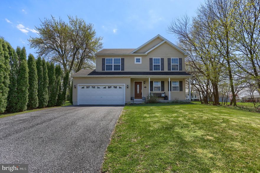 *** An offer has been received and the deadline for additional offers is Thursday, 5/2/24 at 12:00 noon. 
 All offers will be presented Thursday evening. Escalation Clauses are welcome! ***  This beauty is only 8 years old and it still feels like brand new!  There is a lot of natural light that streams in the entire home.  Large kitchen with island and all stainless appliances (refrigerator, range, and dishwasher) remaining. All of the bedrooms in this home are extremely large, and the owner's suite has his and hers walk-in closets!  The owner's bathroom is huge and features a corner soaking tub and a large shower stall.  The current owners finished the family room in the lower level for an additional 600 estimated square footage for a total of 2388 estimated living space.  There is also an egress window in the storage side of the basement.  There are natural hardwood floors in the living room, kitchen and dining areas, great for easy cleanup!  Check out the large, maintenance free deck! First floor laundry with the washer and dryer remaining  too!  Water treatment system included for your well water.  All located on a lovely quarter acre flat lot!