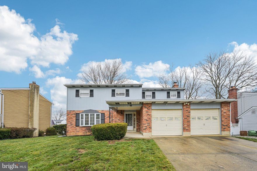Welcome to this spacious single-family home in desirable Catalina Gardens, offering a functional layout and a convenient location. Enter through the covered front porch into the main level, where a bright living room flows seamlessly into the dining room—perfect for everyday living and entertaining. Sliding doors lead out to the rear deck overlooking the flat, fenced-in backyard. The dining room opens to the updated kitchen, featuring stainless steel appliances, white shaker cabinets, and space for a breakfast table. Just off the kitchen, the cozy family room is highlighted by a wood-burning fireplace and a set of French doors that open to the rear patio and yard with a shed—creating great indoor-outdoor living opportunities. A full bathroom and access to the attached two-car garage complete the main level. Upstairs, you’ll find four spacious bedrooms, including a large primary suite with its own ensuite bathroom. The three additional bedrooms share a full hall bathroom. The finished basement adds valuable living space with a large rec room ready to suit your needs—whether a media room, playroom, or home gym—along with an unfinished area that provides plenty of storage and a laundry space. Recent updates include a new roof, added gutter leaf guards, and fresh paint. Ideally located close to gas stations, restaurants, bus stops, and shopping, with easy access to I-95, this home offers both comfort and convenience. Mortgage savings may be available for buyers of this listing.