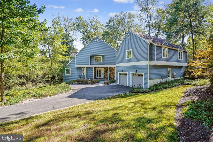 Welcome to this unique, sunny, open & bright home on a private, landscaped 3/4 acre lot in wonderful, woodsy and convenient Franklin Park. Offering 5+ bedrooms and 5.5 baths, perfectly designed for comfort and style. The main level boasts gleaming hardwood floors, a spacious living room, formal dining area with a stone front gas FP. Convenient pocket doors provide easy access from the Dining Room to the gourmet, eat in kitchen with Island and Table seating, Stainless Steel Appliances and tons of storage, counter & cabinet space. Adjacent to the gourmet kitchen, the family room impresses with vaulted ceilings, oversized windows and two sets of French doors that lead to a covered porch with fire pit and an expansive deck that are ideal for al fresco dining and enjoying the outdoors. The main level also includes a private home office with custom built-in bookcases. This office can easily be converted into a bedroom with a private ensuite bath. Upstairs you will find the deluxe Primary Suite with walk in closet and luxurious bath. Note the 2 sided shower! Plus, 4 generously sized bedrooms, 3 full baths, and an additional office for work or study. The walk-out "daylight" lower level includes a large recreation room, separate bedroom, oversized den/workout/movie room, full bath and ample storage space. The garage has an EV Plug plus plenty of space for all of your "Big Kid Toys"! Convenient Mud Room with sink, built ins, Cubbies and Laundry. Sitting on a gorgeous ¾-acre lot, this property offers privacy and space while remaining close to all McLean has to offer. Don't miss the opportunity to make this exceptional home yours!