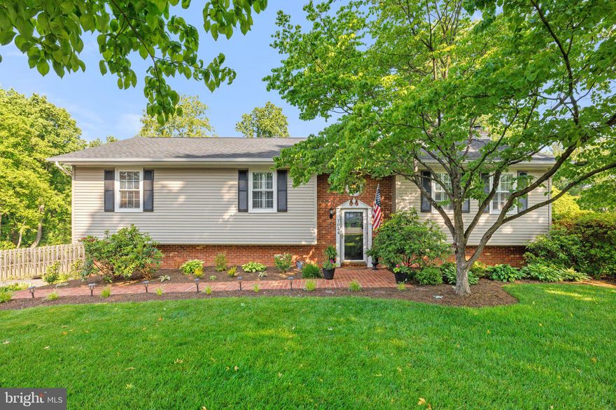 It doesn't get much better than 7034 Stafford St - truly HOME SWEET HOME!   Meticulously maintained and thoughtfully updated, the home is sited on a double cul-de-sac street at back end of desirable Warrenton Lakes.  The .64acre lot is idyllic and serene. The interior contains gorgeous hardwood floors on main level; 3 ample bedrooms, updated baths and kitchen w/ Stainless Steel appliances . A bonus 4th bedroom (just inches shy of egress exit) is in the finished lower level, along with an enormous Rec Room w/ gas-burning fire place, 1/2 bath and spacious laundry room.  However, the showstopper of the home is the outdoor spaces, which you can enjoy from your screened in porch off the kitchen - or on the custom patio accessed from the basement great room.  And those hardwood floors -  you must walk barefoot over them to experience how silky they feel! The home is just perfection,  inside and out!