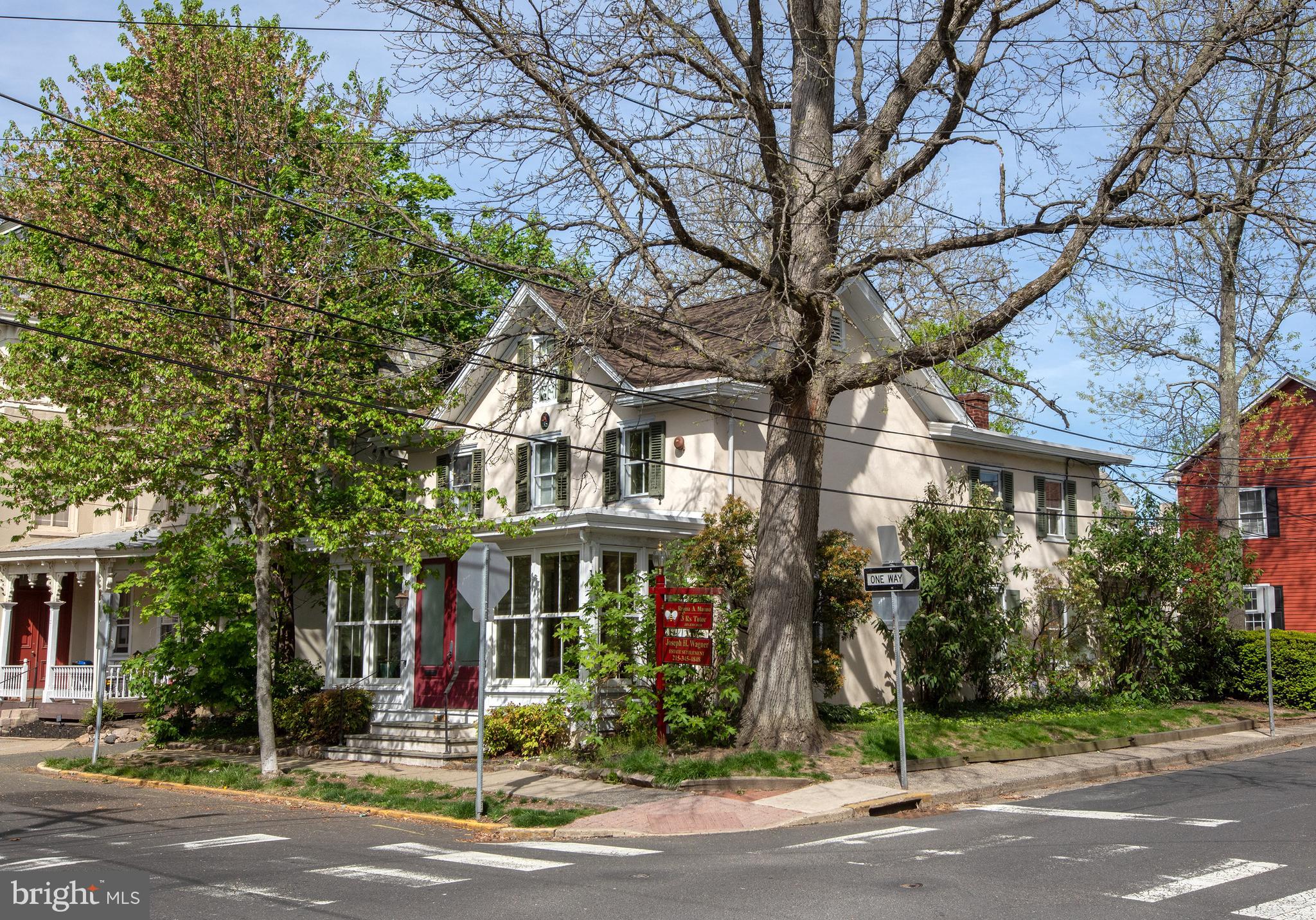 The Edward Heston House: dating back prior to 1845, this plaster-over-stone building is listed on the National Register of Historic Places and currently features a charming two bedroom dwelling in combination with a business but would also make a perfect full-office conversion (consult zoning ordinances available online). Located directly in (not adjacent to) the center of downtown Doylestown, enjoy immediate walking access to the shopping district, County Theater, Michener Museum, and restaurant row. Original wide plank pine floors, deep set windows and custom built ins throughout, enter through the bright due-South facing Sunroom with oversized windows, perfect for any plant lover and a great spot to sit and people watch. The main level includes a large home office/meeting room which can double as a dining room, a formal living room and full kitchen with back entrance from the ample paved parking lot (room for easily 4-6 vehicles). The private back yard features a stone terrace area, stands of mint and blueberry and quince bushes, and an attached shed/storage structure. Looking for more space? The existing footprint could offer a great opportunity to expand the upper floors and create something customized to your liking. New roof, H/W heater, newer Central AC and minisplit, radon remediation system, partial exterior CCTV and security system ready, etc. Consult Borough Zoning online for explanation of dwelling-in-combination and other potential uses by right.