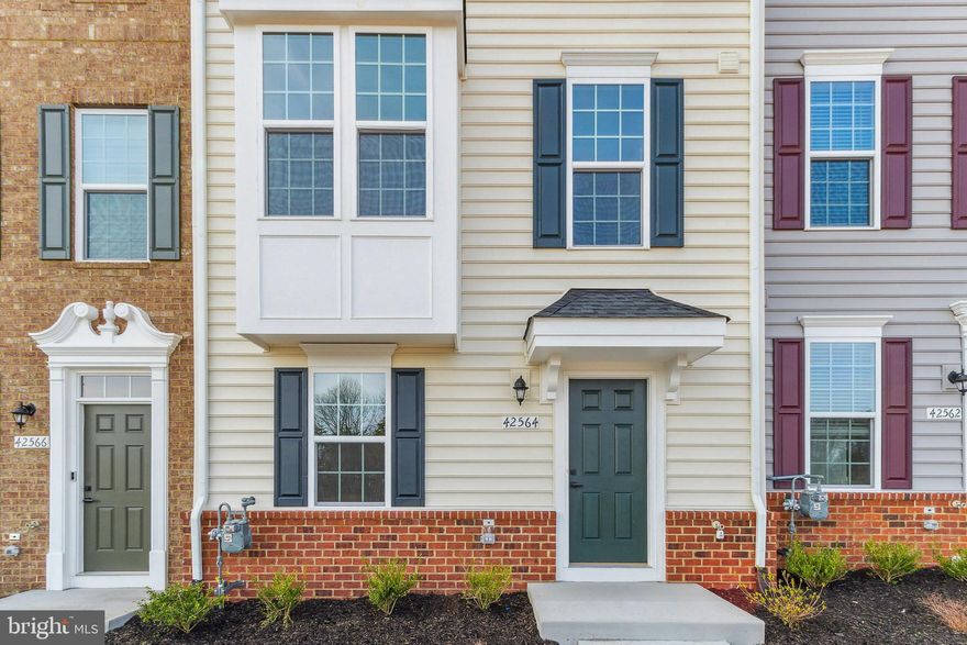 Welcome to 42564 Antonia Terrace in Sterling! This beautiful and spacious townhome offers modern living in a prime location. Featuring 3 bedrooms, 2.5 baths, and a bright open-concept floor plan, this home combines comfort and convenience. Enjoy a stylish kitchen with stainless steel appliances, granite countertops, and ample cabinet space. The primary suite includes a walk-in closet and a private ensuite bath. A versatile lower-level rec room provides extra space for an office, gym, or entertainment area. Relax or entertain on the private deck. Attached 2-car garage and plenty of community amenities nearby. Conveniently located close to major routes, Dulles Airport, shopping, dining, and entertainment. Move-in ready and impeccably maintained—this is one you don’t want to miss!