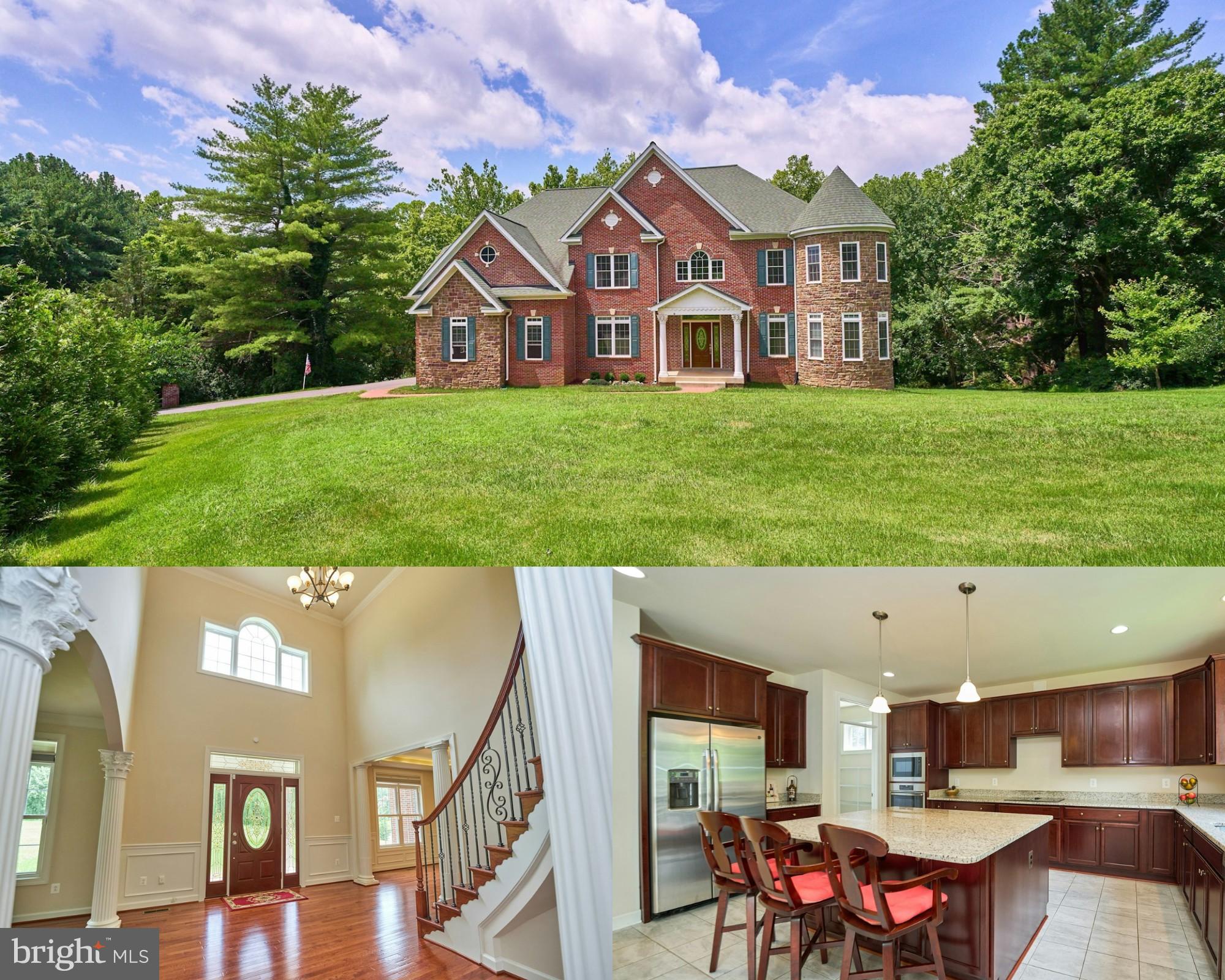 Discover timeless elegance in this exceptionally maintained 2019-built home, ideally located in the heart of Great Falls. This home offers more than just refined living—it’s a lifestyle. Step through a dramatic two-story foyer adorned with a Palladian window and gleaming hardwood floors, setting a tone of classic sophistication. The formal dining room features rich wainscoting and a tray ceiling with accent lighting, perfect for hosting elevated gatherings.
The gourmet kitchen is a chef’s dream, highlighted by pendant lighting, stainless steel appliances, soft-touch cabinetry, and luxurious granite countertops. A spacious central island with built-in electrical outlets makes meal prep and entertaining effortless. The adjoining walk-in pantry and mudroom off the garage enhance convenience and organization.
Gather in the stunning two-story family room anchored by a brick fireplace that radiates warmth and ambiance. A full walk-out basement with a second fireplace opens to the backyard, creating seamless indoor-outdoor living possibilities. The main-level office offers a serene workspace with wooded views, complemented by a nearby powder room for added function.
A truly distinctive architectural feature elevates this home: a striking two-story turret rising gracefully from the foundation, capped with a conical roof and wrapped in a gentle arc of windows. It creates a magical circular space—ideal for a piano room on the main level and a cozy reading nook above.
Upstairs, you’ll find four spacious bedrooms, each with its en-suite bath. The primary suite includes a spa-like bathroom with a soaking tub and a walk-in shower. A sunlit laundry room with a window brings a touch of joy to daily chores.
Energy-efficient day-night shades and dual thermostats offer comfort and savings year-round. The exterior—three sides of brick—adds insulation, durability, and quietude. Enjoy swift access to Route 7, making winter commutes safer and faster. Close proximity to the elementary school and Nike Park.
Tech-friendly enhancements include built-in USB charging stations: one dual-port outlet in the kitchen and two dual-port outlets in the primary bedroom.