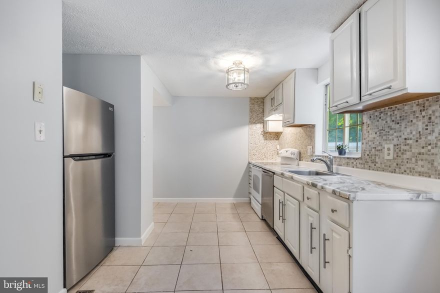 Price Adjustment, Why rent when you can buy!  Welcome to this  three level townhome, nestled in a cul-de-sac in the heart of Montgomery Village!  Add your finishing touches to make this your own.
This home features classy hardwood floors throughout,  Enjoy your  modern eat-in-kitchen with durable countertops,  ceramic tiles and all the cabinet space you'll need in your walk-in Butler's pantry.  Owner's suite has 2 generous size closets. 
Fully Fenced Backyard Backs to Trees offers plenty of space to relax or entertain...
Fully Finished Basement w/ Huge Rec Rm & Full Bath,  professionally painted.  Location allows for easy access to shopping,  dining, schools  and major expressways. 
Please park in assigned parking spaces number 5 & 6.