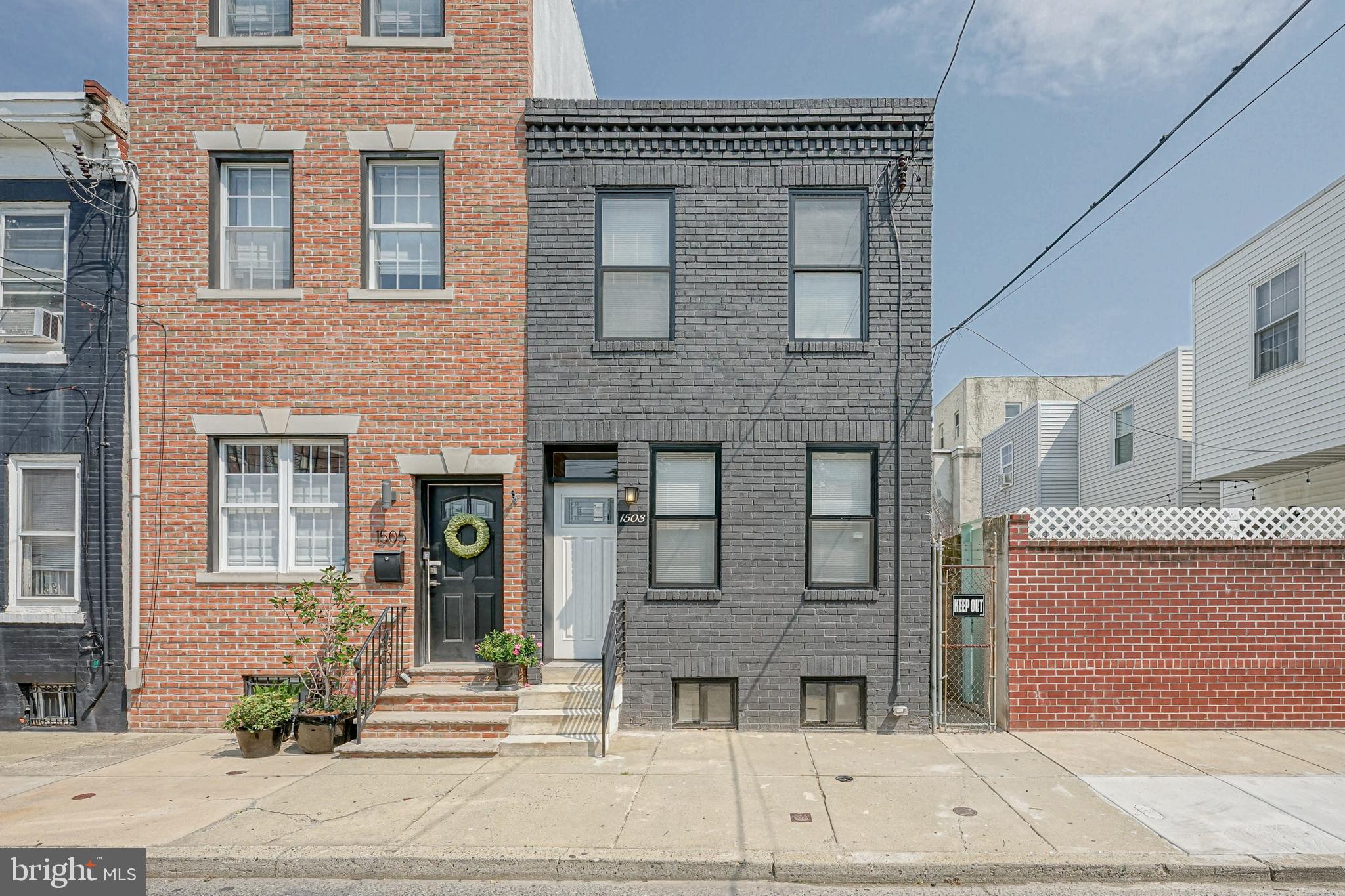 Beautifully renovated brick-front row situated on a quiet block in Point Breeze that is as close to new construction as you can get.  Enter to find newly installed hardwood floors, exposed brick wall and fresh paint throughout.  The main level consist of a spacious living room with recessed lights with open concept leading to the dining area and awesome kitchen with an abundance of new cabinets, granite counters with subway tiled backsplash, breakfast bar with pendant lights and all new stainless steel appliances including 5-burner gas range & oven, built-in microwave & dishwasher and French door refrigerator with water/ice dispenser that is included.  Exit the kitchen to the private rear yard that is great  for entertaining.  The upper level hosts 2 spacious bedrooms with plenty of closet space, a convenient upper level laundry room with washer & fryer that are included and breathtaking bathroom with marble floors, dual vanities, new toilet, and stall shower with beautiful subway tiled surround.  The lower level offers a 3rd bedroom with huge closet, 2nd full bathroom that mirrors the main bathroom, siting area and storage.  This house has been completely remodeled from top-to-bottom and includes a new roof, new HVAC/central air, new water heater, new windows and the list could go on.  Conveniently located only steps from the Broad Street Line and a 15-minute walk to Center City. Will not disappoint.