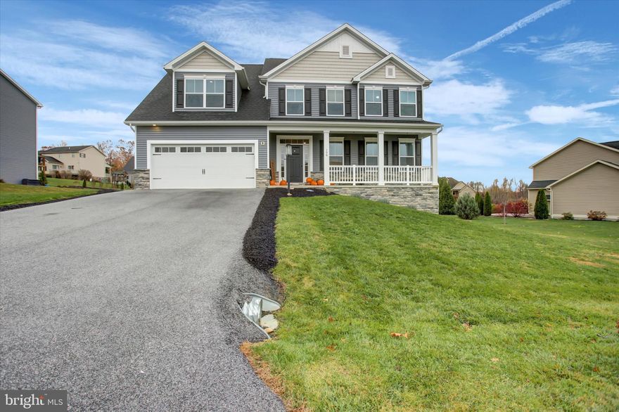 Welcome to 106 Granny Smith Lane, a well-maintained 4 bedroom, 2.5 bath two-story home. This home offers a functional and spacious layout with modern finishes throughout. The main level features an open floor plan including two large living areas with a family room that includes crown molding and a gas fireplace, creating a warm and comfortable gathering space. The kitchen is equipped with white cabinetry, granite countertops and  stainless steel appliances.  A separate dining area provides additional room for everyday meals or entertaining and access to the back deck. The second floor includes four generously sized bedrooms. The primary suite offers exceptional space with room for a sitting area or office, along with a private bath featuring a double vanity, soaking tub, separate shower, and a large walk-in closet. An additional bedroom also includes a walk-in closet, and the remaining bedrooms provide flexibility for guests, home office, or hobbies. A full hall bath and convenient second-floor laundry complete the upper level. The home includes a full, unfinished basement offering potential for future expansion or ample storage. Exterior features include a welcoming front porch, rear deck, and a well-kept yard. 106 Granny Smith Lane presents a comfortable floor plan, modern amenities, and a convenient location all ready for its next owner.