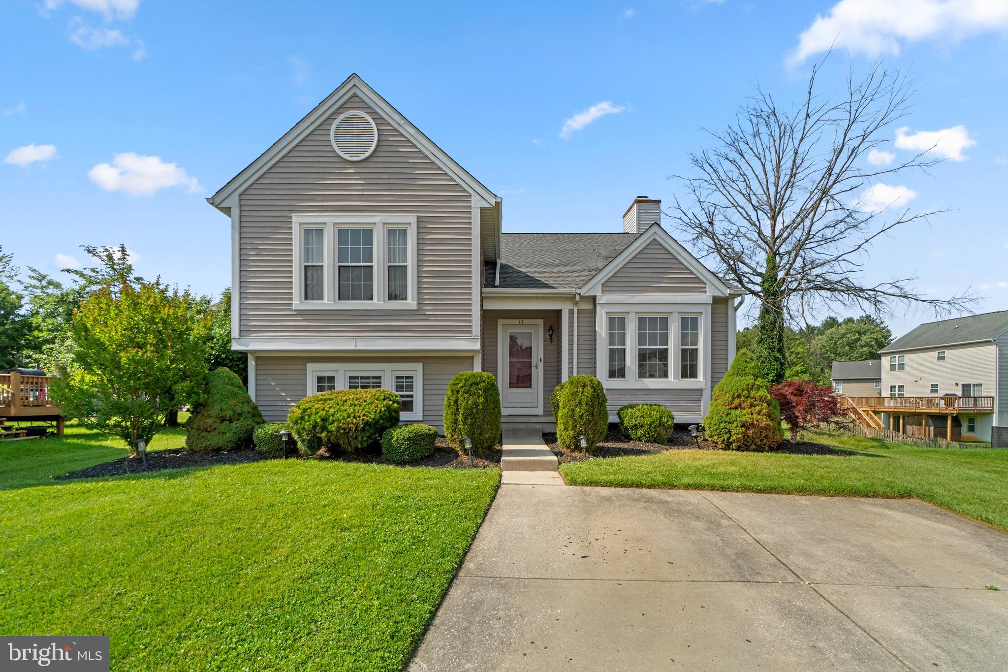 Lovely 4 bedroom 3 bath detached home with 2 car parking pad and level lot in Reisterstown. Eat-in kitchen has S.S. appliances, granite countertops and access to raised deck in backyard. Hardwood flooring in main level living room and 3 upper level bedrooms. One full bath in primary bedroom and 1 off of upper hallway. Lower level has additional bathroom and carpet in 4th bedroom and family room with brick surround wood burning stove. Unfinished section of lower level has laundry and storage room. Must See!!!