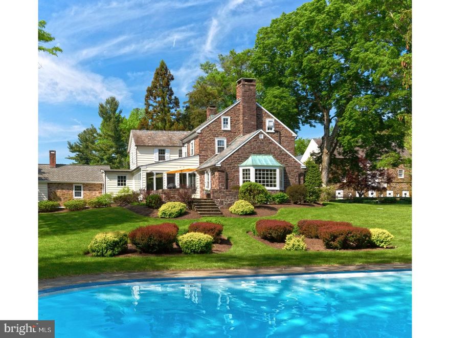 This majestic stone farmhouse became the subject for one of Bucks County's most renowned artists and continues to inspire the creativity and beauty synonymous to this area. Providence Farm, built in the 1800's as evidenced by the cornerstone, has retained many of its original features and all 32 of its original acreage. This enticing property not only provides priceless serenity, but offers many opportunities to pursue various agricultural and cultural interests. Purists will savor the slate and tin roofs, pumpkin pine floors, deep window sills, transoms above and threshold stones below the doors with paneled scuncheons, built-ins throughout, exposed beams and stone walls. There are five fireplaces throughout the home. A sunroom with panoramic views of the inground pool, pond and rolling pastures leads out to a flagstone terrace complemented by stone walls and picturesque scenery. The Roger Wright custom kitchen includes both granite and wood counters, stainless steel appliances, and a center island with seating. The main floor master suite is a sanctuary in itself; with a separate den and luxurious spa bath. French doors in the 2-story master bedroom open upon a private stone terrace overlooking one of two spring-fed ponds. Two sets of kite winder stairs provide access to the 2nd floor bedrooms, where a princess suite could also serve as an optional master bedroom. The other two bedrooms share a hall bath. The walk-up attic is floored and could possibly be finished for additional living space. Many original structures remain and have been cleverly incorporated into today's modern world; a secret garden is anchored by the stone ruins of an old building, the springhouse now contains the pool equipment, while the chicken coop shields the fuel tank from view. A portion of the main floor of the bank barn serves as a 2-car garage, while the remainder could house livestock. The upper loft has a 2 bedroom rented apartment with 1 car garage which looks out onto pastoral scenery. Currently under Act 319, this property is adaptable to a great many uses and poses endless possibilities for equestrian pursuits, organic farming, a gentleman's farm, or country retreat. Abundant wildlife for the nature enthusiast - an ideal setting for those inspired by beauty and ambiance. Located just west of the Delaware River and quaint river villages, this is as convenient as country living gets. Drivable to NY and Philly. Seller is licensed Realtor