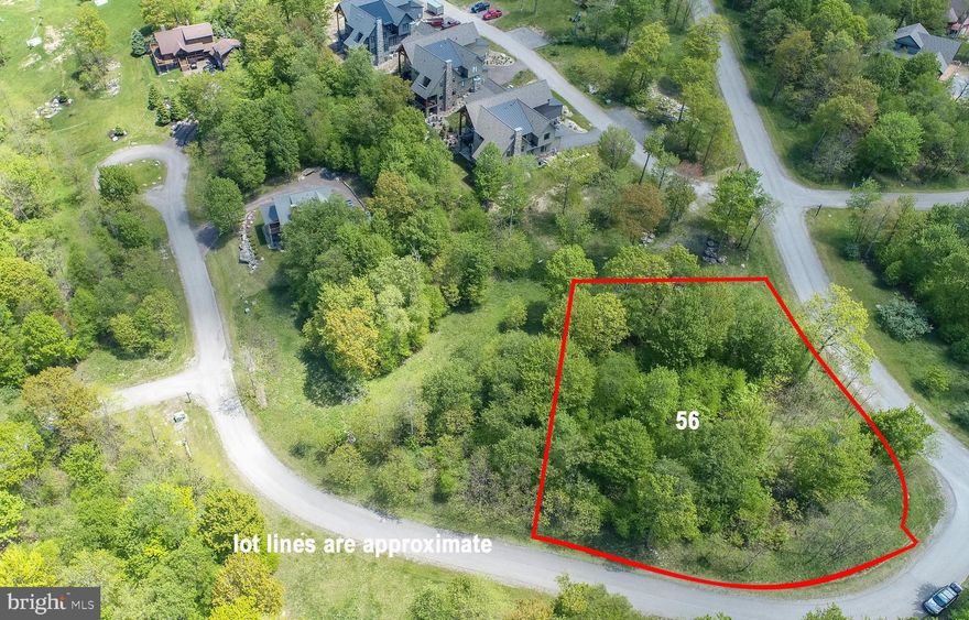 Build your mountain getaway! This beautiful .37-acre corner lot is located in the desirable North Camp community at Deep Creek Lake. The parcel is fairly level, making it ideal for an easier build, and it offers convenient access to Wisp Resort, ASCI Whitewater Course, and all of McHenrys attractive activities, restaurants, and shopping. Tucked in a peaceful, scenic neighborhood with paved roads and underground utilities, this lot is the perfect spot to create a full-time residence, vacation home, or investment property. Situated close to Chair 7, this property provides quick and easy access to the slopes for winter sports enthusiasts, making it the perfect base for all-season outdoor adventures. With year-round recreation at your doorstep, this is your chance to own a slice of Deep Creek paradise!
