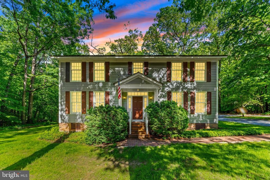 Welcome to 16909 Batchellors Forest Road—an exceptional custom-built colonial nestled on 28.47 private acres in the heart of Olney, Maryland. Inspired by the historic Charlton House of Williamsburg, Virginia, this elegant 1988 residence blends timeless architecture with thoughtful updates and modern comfort.

Tucked away in serene seclusion yet just minutes from Olney’s vibrant town center, the property offers the rare combination of privacy and convenience—with easy access to shopping, dining, and the Glenmont Metro Station, just 20 minutes away for a stress-free commute into Washington, D.C.

Inside, the 3,466 square-foot home showcases classic craftsmanship, including re-milled antique heart pine floors that lend warmth and character to the living and dining rooms, main hallway, and a versatile bonus room currently serving as a home office. The traditional floor plan includes four spacious bedrooms and two and a half baths. A central fireplace—originally wood-burning, now converted to gas—serves as a cozy and charming focal point, adaptable to your preferences.

Recent upgrades include a brand-new roof, fresh interior paint, professionally cleaned windows, power-washed exterior and roof, updated landscaping, a cleaned septic system (March 2025), and HVAC servicing—ensuring peace of mind.

The oversized three-car attached garage offers abundant space for vehicles, storage, or a workshop, making this home as functional as it is beautiful.

Timeless elegance, unmatched privacy, and a location that balances retreat with accessibility—this is a one-of-a-kind opportunity to own a piece of refined country living just outside the city.