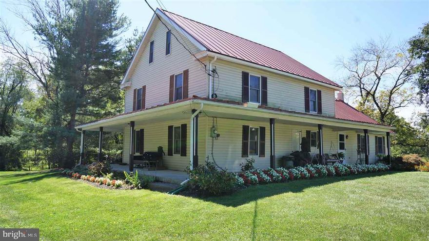 Own a piece of History w/this well preserved home on 2 acres of beautiful landscape w/stream running by. Offers original exposed beams on walls & ceilings, HW flrs thru-out, cast iron-claw tub, handmade brick flrs in Kit & Root Cellar. Sellers added an amazing Great Room w/wooded "A" frame ceiling, lg stone wall to frame a wood stove, 2nd flr Loft overlooks the Great Room & sunken Hot tub. With the 2+4 car Gar & the addition of modern comfort this country setting would make a delightful place to live.