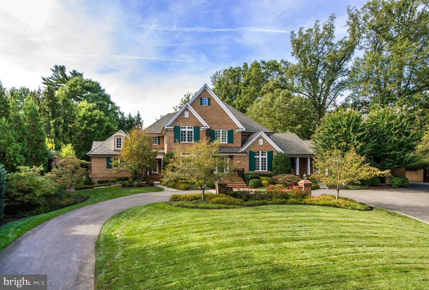 Exceptional brick French-country style residence on sought-after Basil Road. Gourmet kitchen, large family room, main level Master suite, etc. all offering high level of finish. Guest suite above garage and an absolutely stunning lower level. Updates throughout! Property is setback from street offering privacy and deep backyard with patio, pool, yard and stunning hardscaping. 3-Car garage!