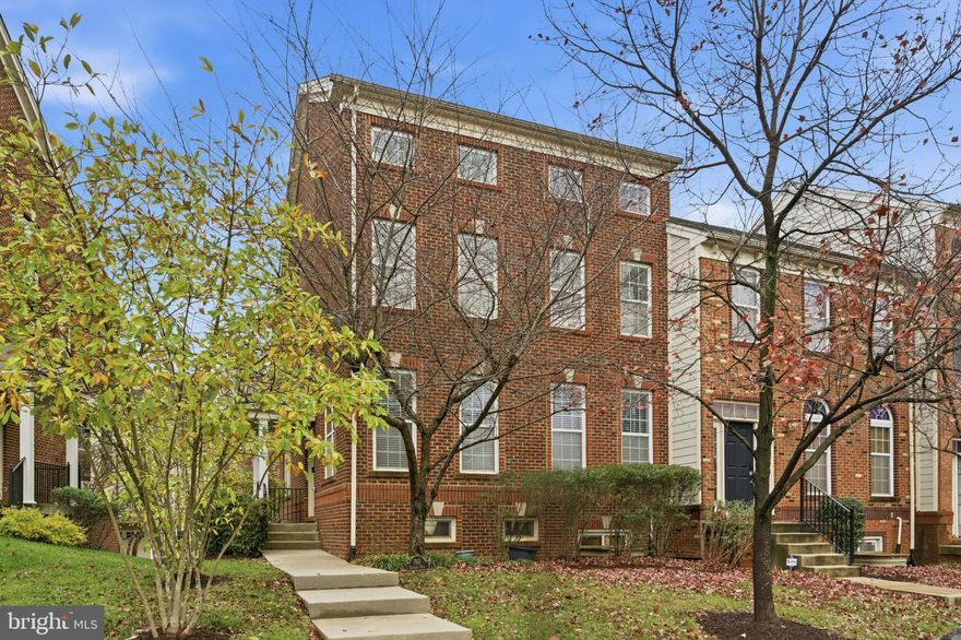 Nestled in the charming community of The Enclave at Arundel Preserve, this stunning Colonial townhouse offers a perfect blend of comfort and style. Built in 2010, this end-of-row home features a warm brick exterior that invites you in. With four spacious bedrooms and three and a half bathrooms, there's ample room for relaxation and entertaining. The heart of the home is the inviting living space, complete with a fireplace that adds a touch of warmth and ambiance, making it an ideal spot for cozy evenings. The fully finished basement provides additional living space, perfect for a home theater, playroom, or office, catering to your lifestyle needs. The attached garage with rear entry ensures convenience and easy access, while the concrete driveway offers ample parking for guests. Enjoy the low-maintenance lot, allowing you more time to relax and enjoy your new home. This property is not just a house; it's a place to call home, where comfort meets functionality in a vibrant community. Don't miss the opportunity to make this inviting townhouse your own!