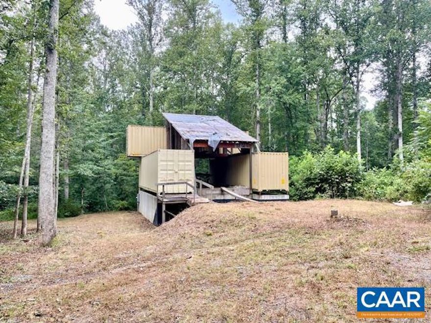Owner Financing Available.  Modern, eco-friendly retreat perfectly in tune with the Blue Ridge mountain lifestyle. Tucked back on a serene wooded lot, this contemporary container home?set on a permanent foundation?is ready for a buyer with vision. The heavy lifting has already begun: electricity and a private well are in place, the property has been perked, and construction is underway. Now it?s your turn to take the reins and finish the build exactly to your taste. Located just minutes from local conveniences and only 15 minutes from the Swift Run Gap entry point to Shenandoah National Park, this property offers the perfect blend of privacy and accessibility. Whether you envision a modern weekend retreat, a vacation escape, or a unique full-time residence, the setting is ideal for embracing the beauty of the Blue Ridge Mountains. A rare opportunity for those ready to create something truly special?your contemporary container home dream starts here. Taxes are estimated based on the list price. See notes in DOCS for floorplans, features etc.. of this unique property.,Bring Your Container Home Vision to Life