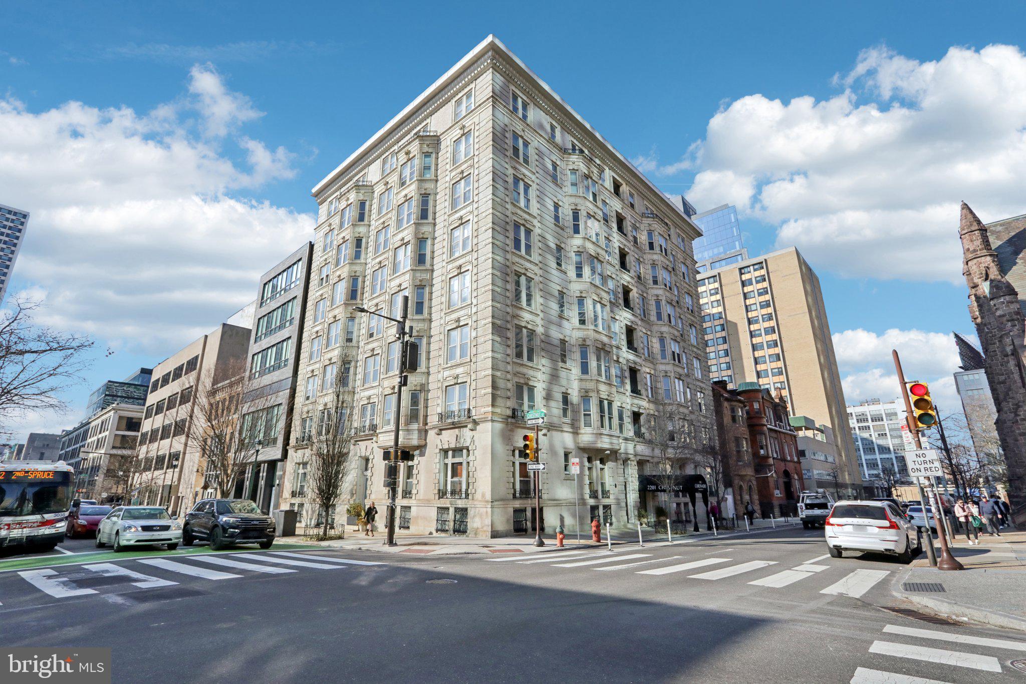 This classic two-bedroom, two-bathroom & DEN home at The Coronado (2201 Chestnut St) is a rambling charmer. Blending pre-war architectural details with modern updates in The Rittenhouse area, Unit 202 features Two Bedrooms, a den, AND a formal dining area! The Coronado is a boutique, 37-unit building situated on the northwest corner of 22nd and Chestnut in the desirable 19103 zip code. Built in 1910, this historic building is listed on the Philadelphia National Registry of Historic Places and showcases a beautifully restored marble lobby, reflecting its timeless elegance. The condo association is known for its proactive management. Unit 202, a corner unit on the south side of the building, benefits from abundant natural light streaming through its high ceilings and large windows. The well-designed layout includes two bedrooms, a den- perfect for a THIRD bedroom - a formal dining area, and two full bathrooms. Southern exposures provide a sunny and cheerful atmosphere. Original hardwood oak strip flooring throughout (no carpet). A washer and dryer are conveniently located in the kitchen area. Located in the heart of the Rittenhouse Square area, The Coronado is steps from the new GIANT grocery store, within easy walking distance of Rittenhouse and Fitler Squares, Trader Joe's (just one block away), numerous acclaimed restaurants, upscale retail shops, and 30th Street Station, offering convenient access to public transportation and major highways. The building provides residents a secure environment, including a security system and convenient package delivery through the lobby.