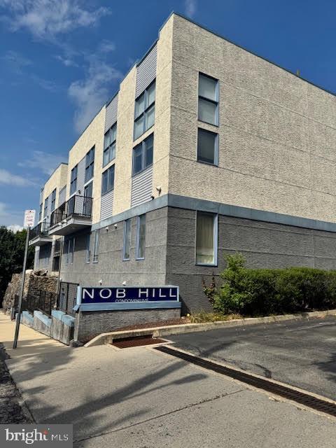 Bright and modern end-unit condo for rent in the desirable Nob Hill community of Manayunk. This beautifully updated home features hardwood floors, sleek stainless steel appliances, granite countertops, and a private patio—ideal for relaxing or entertaining. Enjoy the comfort of central air and the convenience of an in-unit washer and dryer. A dedicated parking space is included with the unit. Residents also have access to a community BBQ and picnic area, perfect for gatherings. Just a short walk to the train station and all the shops and restaurants on Main Street.