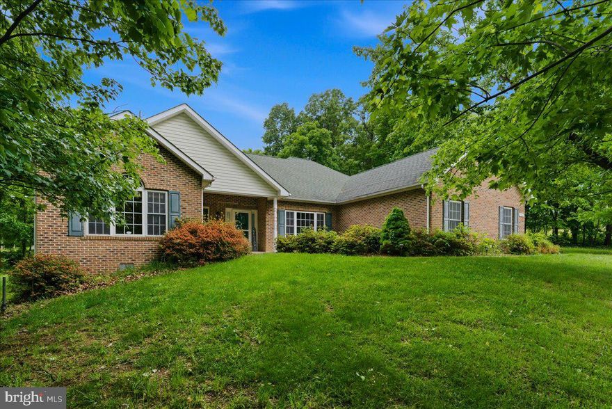 Dreaming of homesteading? This is the one. Previously home to goats, chickens, and sheep, this thoughtfully maintained custom home sits on 7.69 acres with established fenced pastures, a 2-story pole barn with garage bay, chicken coop, greenhouse, and a portable chicken grazing pen. A garden with irrigation dripline already in place with supplies that convey. Multiple fruit trees, elderberry, raspberry, blueberry, and more are already established and producing.

Inside, the desirable split floor plan offers true one-level living with accessibility in mind: 36" doorways, grab bars in the primary en suite, and no stairs throughout. Nine-foot ceilings, a kitchen peek-through to the family room, 42" upgraded cabinets with rollout shelves, and maple wood blinds throughout give the home a polished, intentional feel. The spacious office easily converts to a 4th bedroom. Brand new HVAC, wood stove insert, updated well pressure tank, new induction range, and a host of other improvements offer peace of mind from day one. A 220-amp garage outlet is EV-charger ready.

Wake up to stunning sunrises over open pasture with mountain views. Owners have cleared walking trails throughout the property, perfect for exploring your own slice of the Shenandoah Valley. Lot division potential exists for those looking to keep approximately 5 acres and split off 2 for family. Fixed wireless internet has reliably supported two work-from-home sellers through years of daily video conferencing. Just 3 miles to I-81 and 6.5 miles to I-66, with wineries, the Shenandoah River, and National Parks nearby. Only 2 owners. Ask your agent for the detailed improvements list! Floor plans and video coming soon!