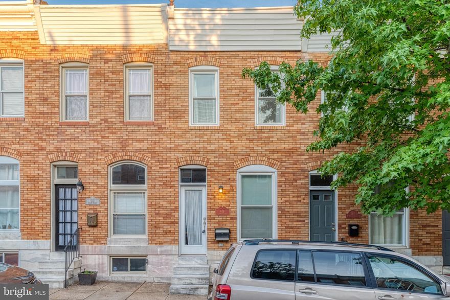 Well kept row-home on a quiet street, blocks away from Patterson Park, Canton Square, and Fells Point. At the main level, you will be greeted by charming original hardwood floors and an updated kitchen that features granite counter tops, SS appliances, and a large island. 2 Bedrooms and 2 baths on the upper level and a finished basement with a wet bar and half bath. Parking Pad.