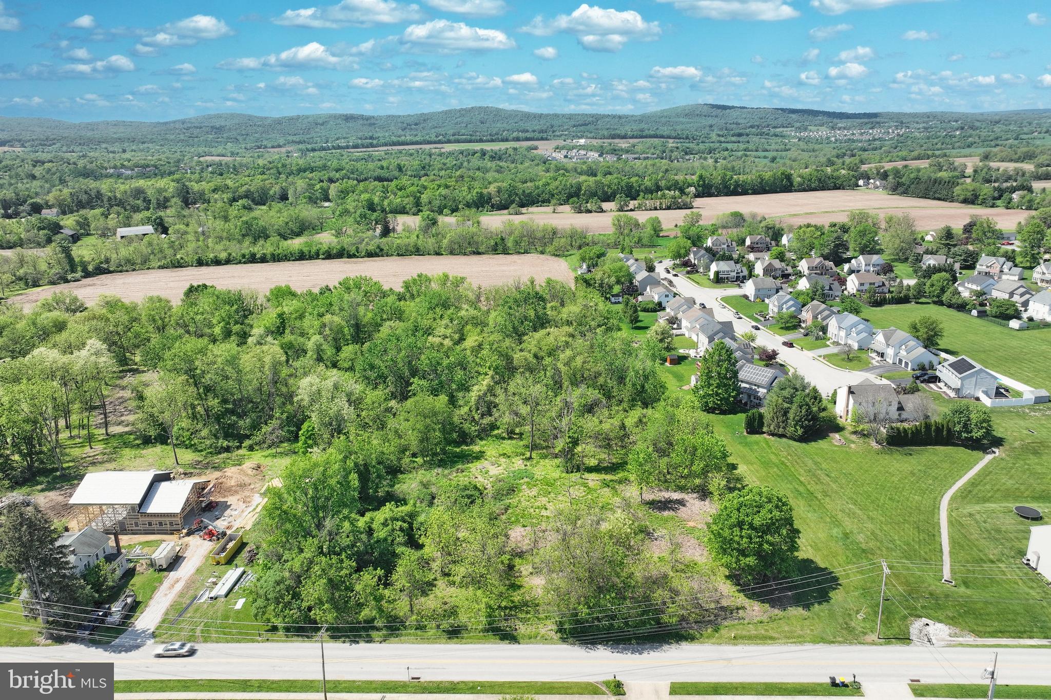 Bring your own builder or work with our trusted builder to create the custom home of your dreams on this rare 1.30-acre level lot. Flat, buildable land like this is hard to come by in the sought-after Central York School District.
Nestled in a peaceful and private setting, this lot offers the perfect retreat while still being conveniently close to Route 30 and I-83, providing easy access to Lancaster, York, and Harrisburg. You'll also enjoy close proximity to shopping, dining, parks, and walkable neighborhoods.
Raintree Road offers a tranquil environment for your future oasis, with public water and sewer available for hookup — making the building process even smoother.
Don’t miss this unique opportunity to secure a beautiful piece of land in an ideal location!