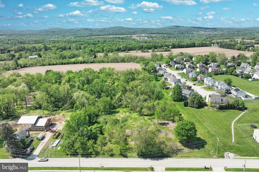 Bring your own builder or work with our trusted builder to create the custom home of your dreams on this rare 1.30-acre level lot. Flat, buildable land like this is hard to come by in the sought-after Central York School District.

Nestled in a peaceful and private setting, this lot offers the perfect retreat while still being conveniently close to Route 30 and I-83, providing easy access to Lancaster, York, and Harrisburg. You'll also enjoy close proximity to shopping, dining, parks, and walkable neighborhoods.

Raintree Road offers a tranquil environment for your future oasis, with public water and sewer available for hookup — making the building process even smoother.

Don’t miss this unique opportunity to secure a beautiful piece of land in an ideal location!