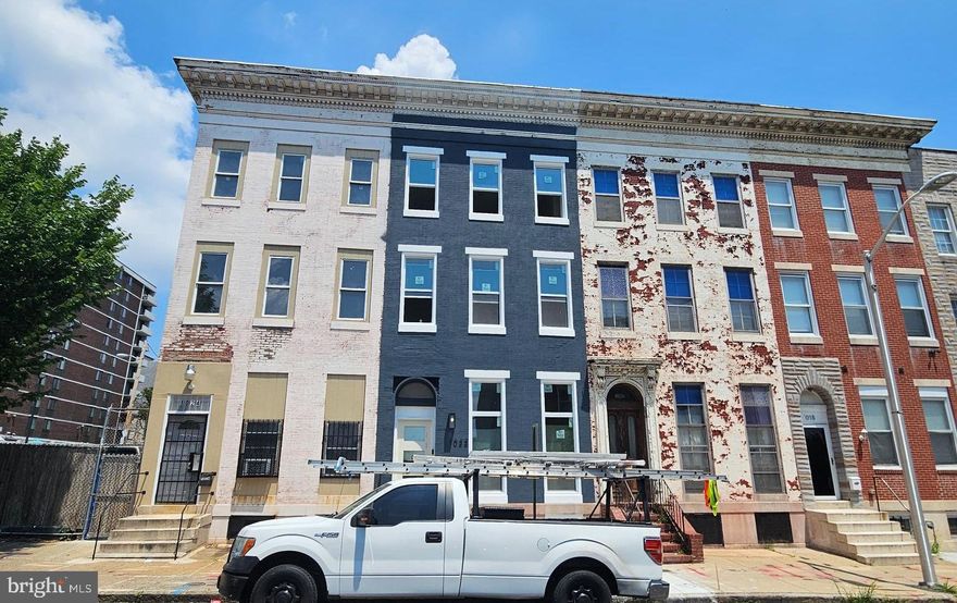 20,000 towards closing cost at purchase price. PAY ALL YOUR CLOSING COST / GET A HOME WARRANTY/ BUY DOWN YOUR RATE . ALSO AGENT BONUS AVAIL FOR A  30 DAY CLOSE . 

Legal 2 Unit Property  . 1 - 1 Bedroom unit currently rented for 1200 a month, 1 - 4 bedroom unit when fully occupied brings in  3600 a month at current rent structure which can be increased by new owner. Rents in 4 bedroom currently 850+850+925+(975 Vacant) . Total Rents 4800 . Rental License and Lead Certificates available. Property also qualifies for 10,000 Vacant to Value Booster. 10,000 Baltimore City First Time Home Buyers incentive.
