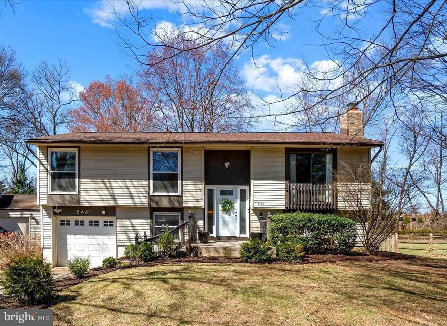 OFFER DEADLINE IS SATURDAY, 3/22 @ 7PM. Move right into this beautiful light-filled home located on a picturesque .43-acre level lot on a non-through street in the Howard High School District! The sprawling fenced backyard offers plenty of room for entertaining, relaxation and play. Impressive interior features include 4 Bedrooms, 3 Full Baths, updated Kitchen and Baths, and woodgrain LVP flooring. The Living Room and Dining Room showcase soaring vaulted beamed ceilings and are ideal for formal or casual gatherings. The kitchen was recently updated with white cabinetry, sleek granite counters, stainless steel appliances, a custom backsplash, and a breakfast bar for additional seating. The Primary Bedroom is ensuite with a fully remodeled Bathroom. Two additional Bedrooms and a remodeled Hall Bath complete the upper level. Relax and unwind in the spacious Family Room on the Lower-Level while enjoying the warmth from the cozy Fireplace. The Lower-Level also features a 4th Bedroom, remodeled Full Bathroom, Laundry/Storage Room, and a walk-out slider to the rear yard. The expansive Screened-In Porch, Deck, and Patio are perfect for hosting outdoor gatherings, while enjoying the tranquility of the large tree-lined backyard. Ample parking in the 1-car garage, extended driveway for 2 additional cars, plus street parking. Enjoy all the amenities that Columbia offers including the Columbia Mall, the new Merriweather District in downtown Columbia with urban energy, casual and fine dining, shopping, entertainment, multiple public parks, and endless walking/biking trails. Super convenient to BWI, I-95, Rt 29, Rt 32, Rt 100, 295, I-70, commuter lots, and Marc Train. This home is move-in ready and won't be on the market for long! BE SURE TO CLICK ON THE FILM REEL ICON IN THE LISTING FOR AN INTERACTIVE 3D VIRTUAL TOUR.