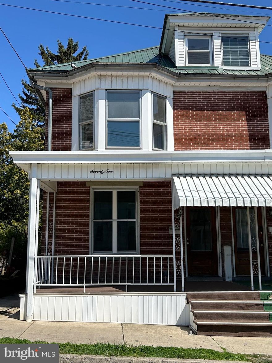 Half duplex on a quiet borough street. Move-in ready with many new updates. Updates consist of:  new windows, new flooring, trim, kitchen, and paint. House is 3 bedrooms, a room on the main level could easily be turned into a 4th bedroom. The exterior has no maintenance with a metal roof and an all brick exterior. The house is much larger than it appears. Schedule your showing today!