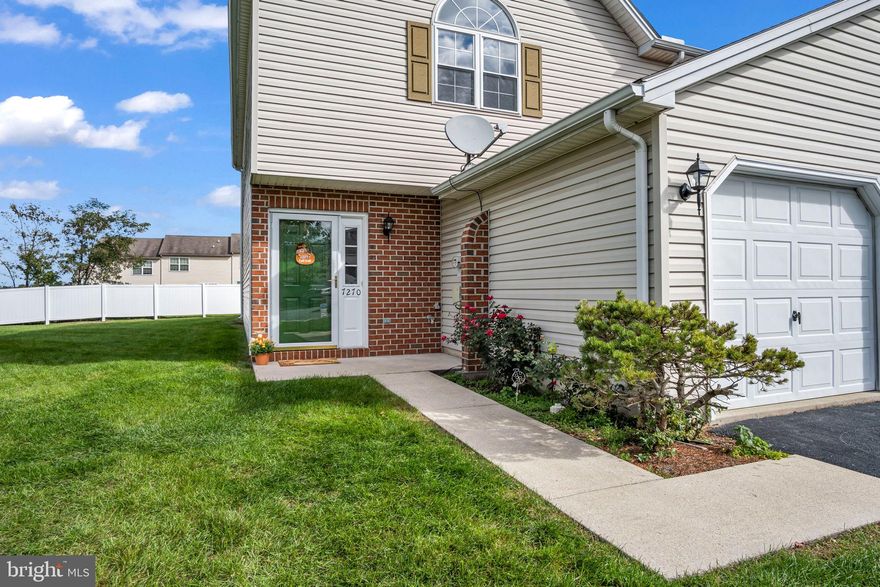 Welcome to this charming and affordable end unit townhouse that offers a perfect blend of comfort and convenience. Boasting a first-floor bedroom with a full private bath, this home ensures accessibility and privacy for residents and guests alike. The kitchen provides ample counter space and storage options as well as an updated refrigerator and dishwasher. The adjacent dining area offers a cozy spot to enjoy meals with loved ones.  The skylights and sliders to the back patio ensure plenty of natural light. The main level laundry provides the opportunity for one floor living and the washer and dryer remain with the home! Upstairs you’ll find 2 additional large bedrooms with a shared full bath and ample closet space. Step outside to a delightful yard that adjoins common space, creating the perfect spot for outdoor activities and entertaining. With a newly updated economical geothermal heat system, you'll enjoy both comfort and significant cost savings on your energy bills.  A new motor has just been installed on the garage door opener.  The attached garage and paved driveway provide several  off street parking spaces.  Enjoy a comfortable and eco-friendly living environment year-round. This home is a true gem for those seeking an affordable and welcoming place to call home. This thoughtful design allows for flexible living arrangements. Don't miss your chance to add your personal touch and call it home!