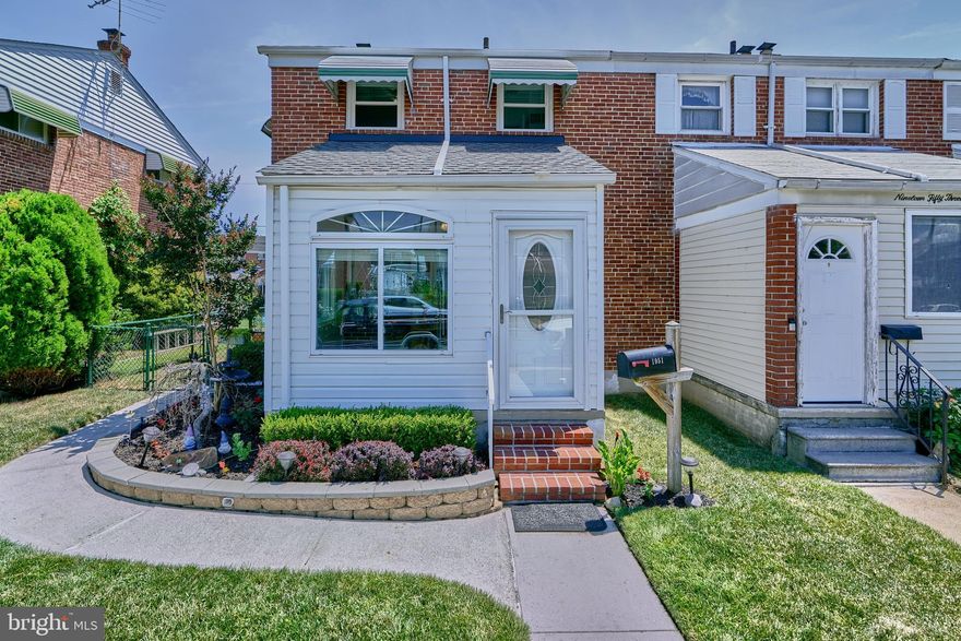 (Open House, Sunday, 7/14, from 12-2pm) This stunning end-of-group brick townhome in the highly sought-after Stanbrook community is a must-see! This sun-filled home boasts an enclosed front porch, fresh paint, newer windows, and beautifully refinished hardwood floors, adding to its charm and appeal. The kitchen features white cabinets, timeless white tile backsplash, a double oven, and new vinyl flooring. A convenient breakfast bar separates the kitchen and dining room, providing bar stool seating and additional kitchen cabinet and countertop space. 
Upstairs, you'll find three ample-sized bedrooms and a completely remodeled full bath with modern finishes. The partially finished basement has new carpet, recessed lighting, and a powder room, offering the potential for a fourth bedroom, office space, or rec room. The fenced-in backyard provides ample space for entertaining, boasting a rear deck with a bar, a separate patio, and a grill gazebo. You never have to worry about parking with the two-car parking pad!
This home is conveniently located close to Stansbury Park, which features playgrounds, ballfields, a scenic pond with a fishing pier, and walking trails. Schedule an appointment to see everything this delightful home has to offer today!