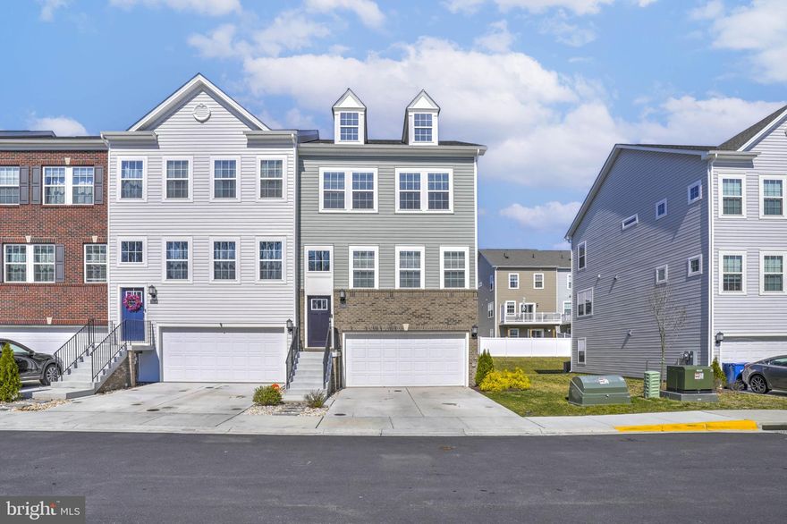 Welcome home to this beautifully designed,  end-unit luxury townhome offering space, style, and everyday convenience.   This 4 bedroom, 3.5 bath residence features a 2 car garage and a thoughtfully designed layout that blends modern finishes with comfortable living.  The gourmet kitchen is the heart of the home, complete with granite countertops, stainless steel appliances, a large center island, and recessed lighting that continues throughout the main living areas. Just off the kitchen, a generously sized deck provides the perfect setting for relaxing outdoors or hosting gatherings.  Upstairs, the spacious primary suite offers a private retreat with an upgraded bath featuring a super shower. The upper level also includes a conveniently located laundry area. The finished walkout lower level offers a fourth bedroom that can easily serve as a guest suite, home office, or additional living space.  Enjoy added privacy with wooded views and the benefits of an end-unit location. Ideally situated just minutes from Solomons Island, shopping, dining, entertainment, and PAX. Don't miss out on this beautiful home!